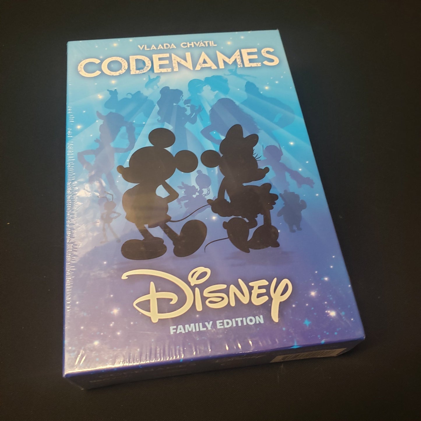 Image shows the front cover of the box of the Disney Codenames card game
