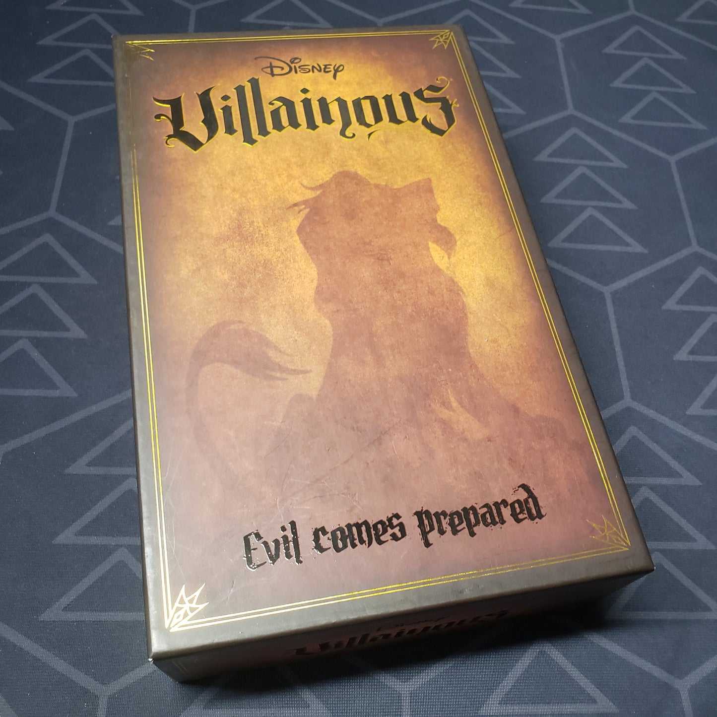 Image shows the front cover of the box of the Disney Villainous: Evil Comes Prepared board game