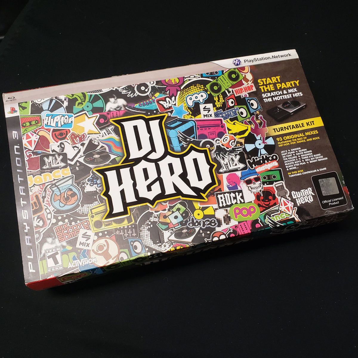 Image shows the front of the Turntable bundle box for the video game DJ Hero for Playstation 3