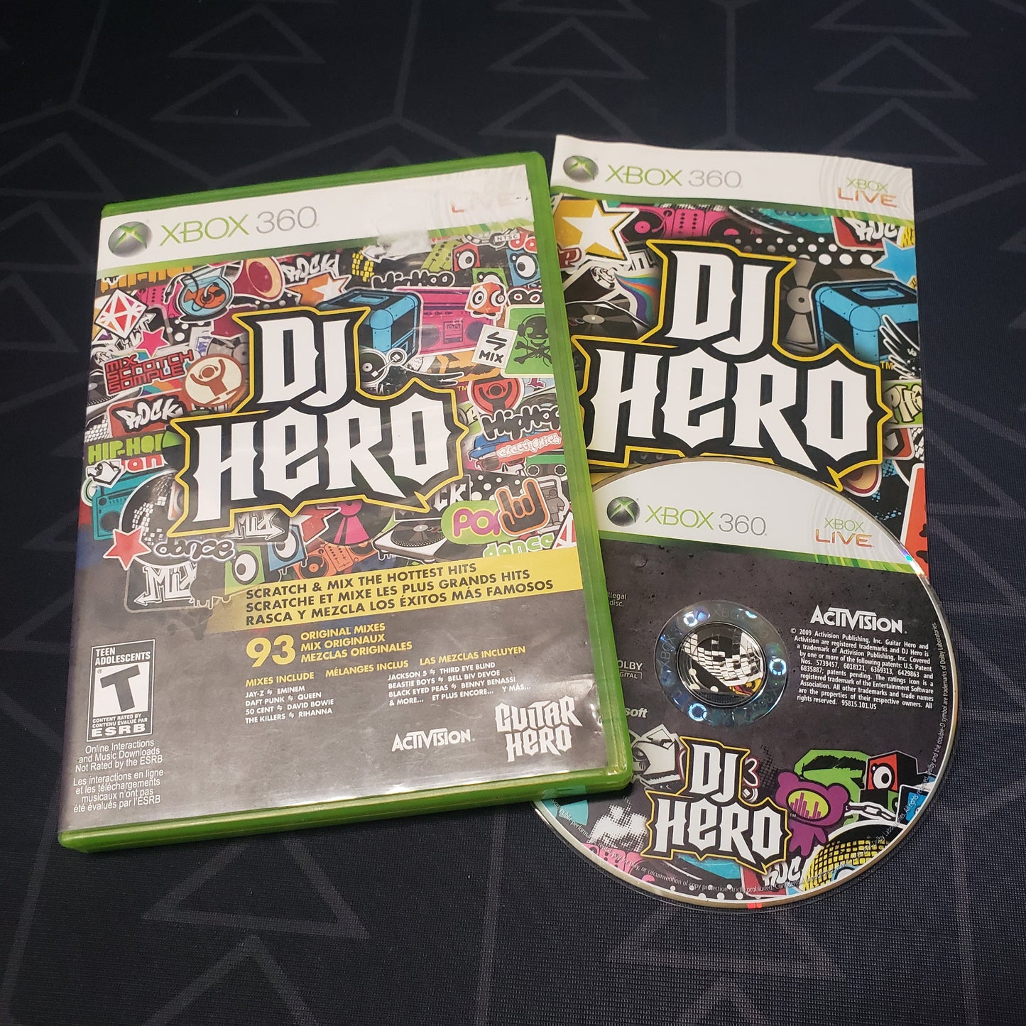 Image shows the case, manual & disc for the video game DJ Hero for Xbox 360