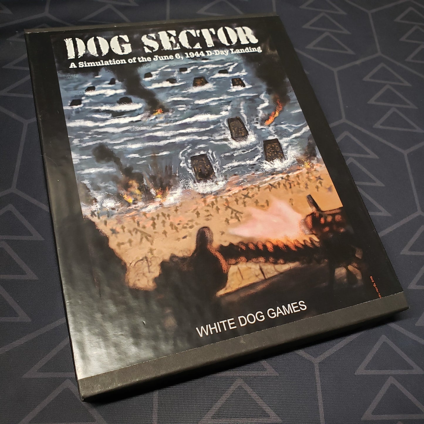 Image shows the front cover of the box for the Dog Sector board game