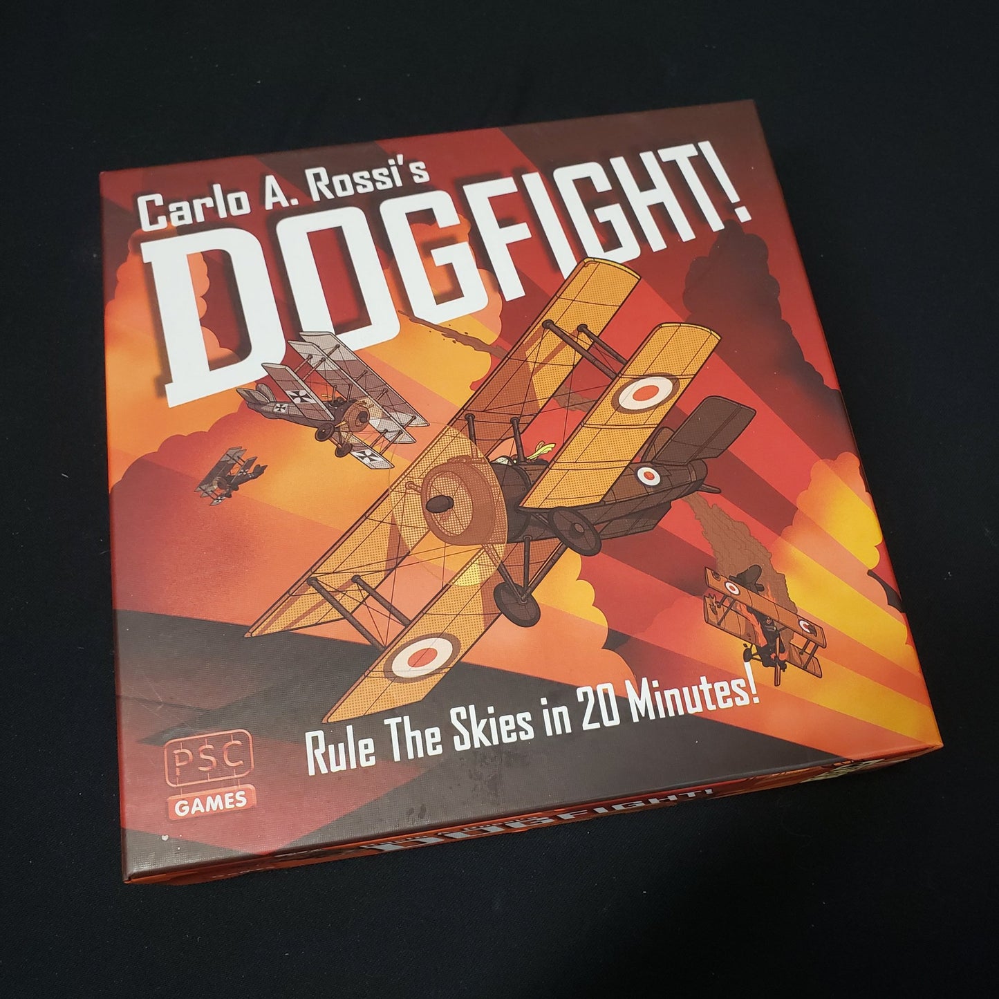 Image shows the front cover of the box of the Dogfight! board game