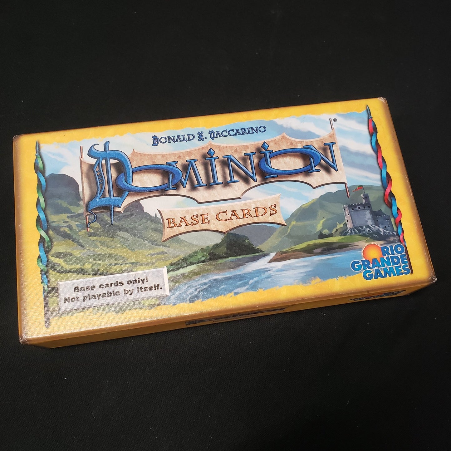 Image shows the front of the box for the Base Cards add-on for the card game Dominion