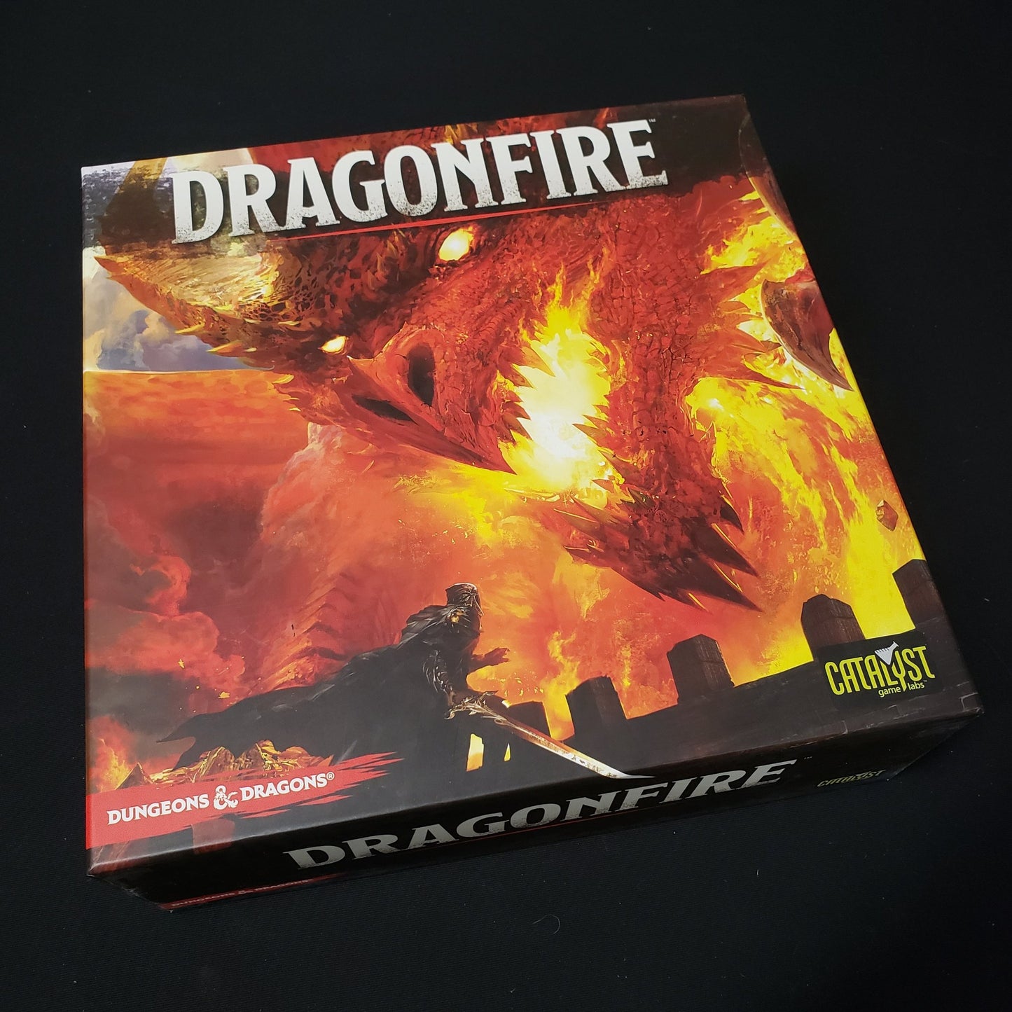 Image shows the front cover of the box of the Dragonfire board game