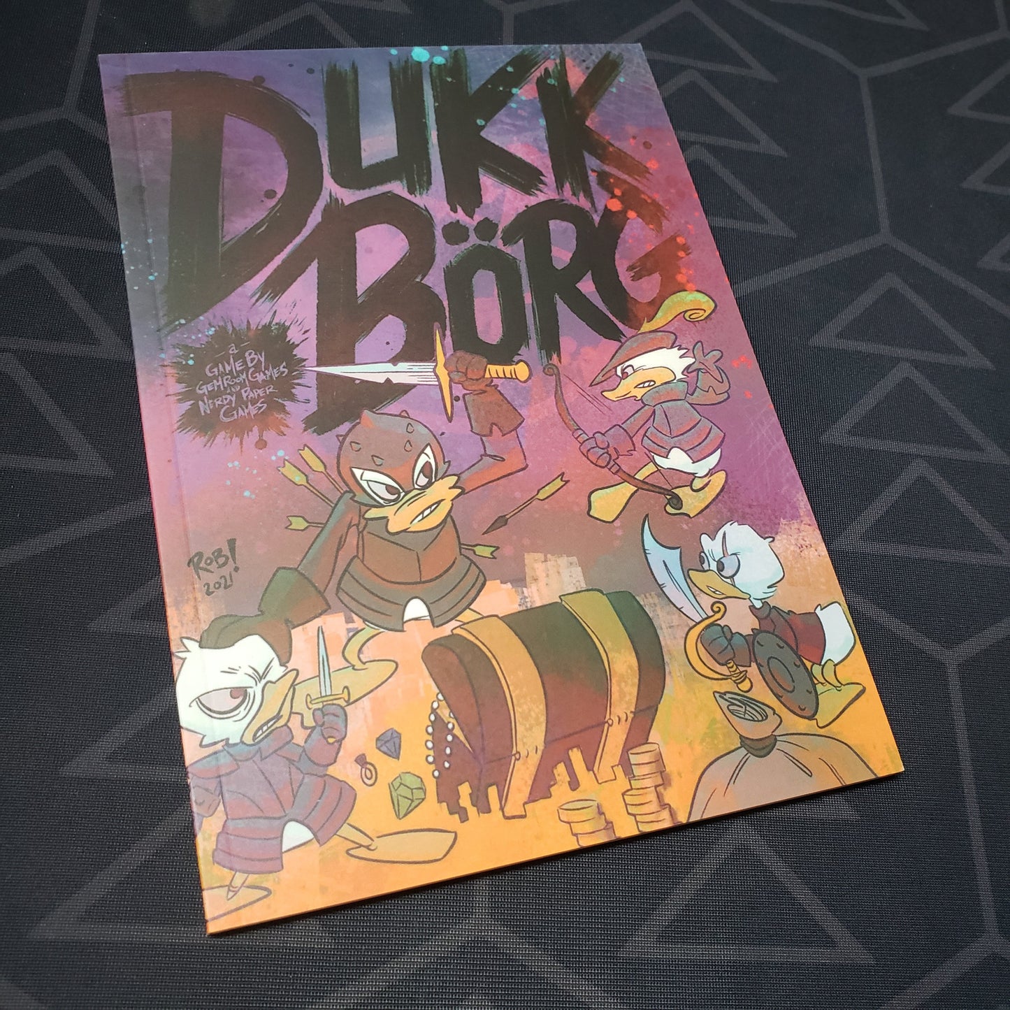 Image shows the front cover of the DUKK BORG roleplaying game book