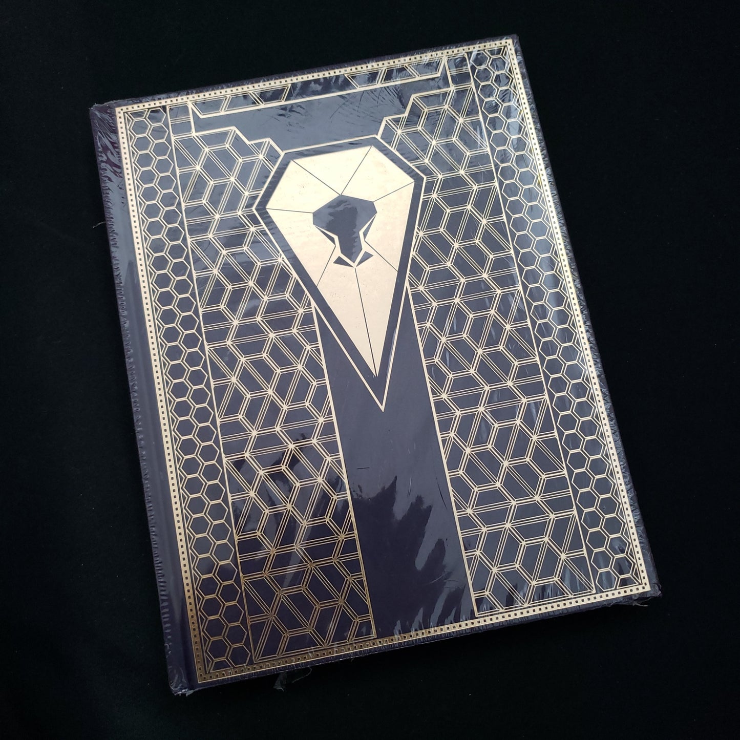 Image shows the front cover of the Collector's Edition core rulebook for the Dune: Adventures in the Imperium roleplaying game