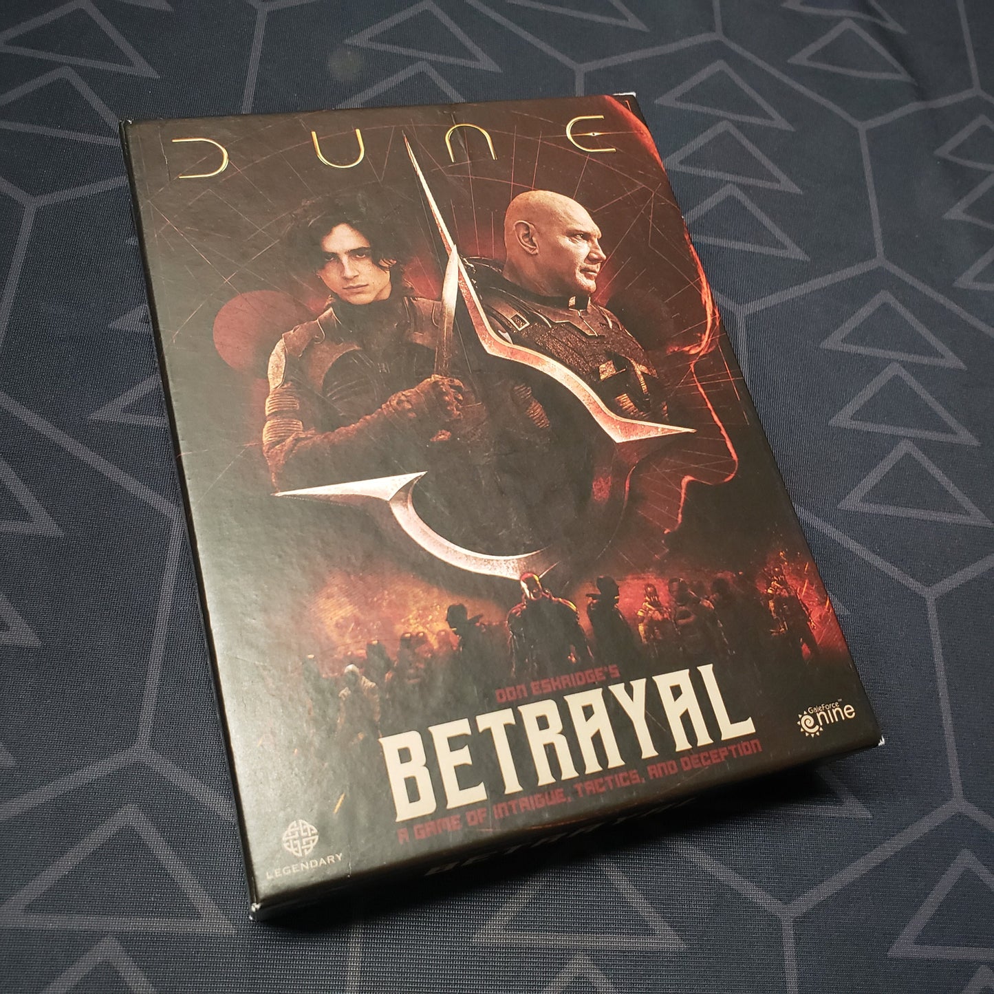 Image shows the front cover of the box of the Dune: Betrayal card game