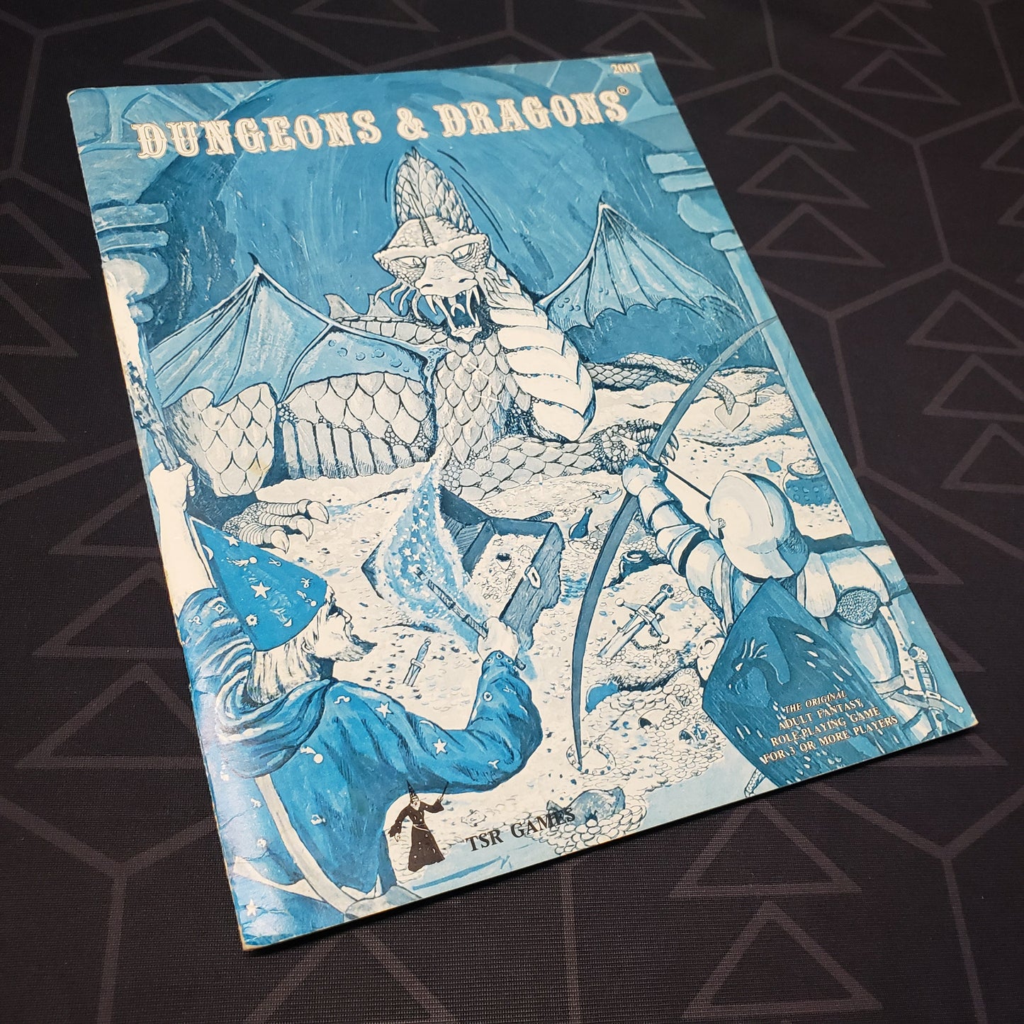 Image shows the front cover of the 1979 Basic Rulebook booklet for the roleplaying game Dungeons & Dragons 1E