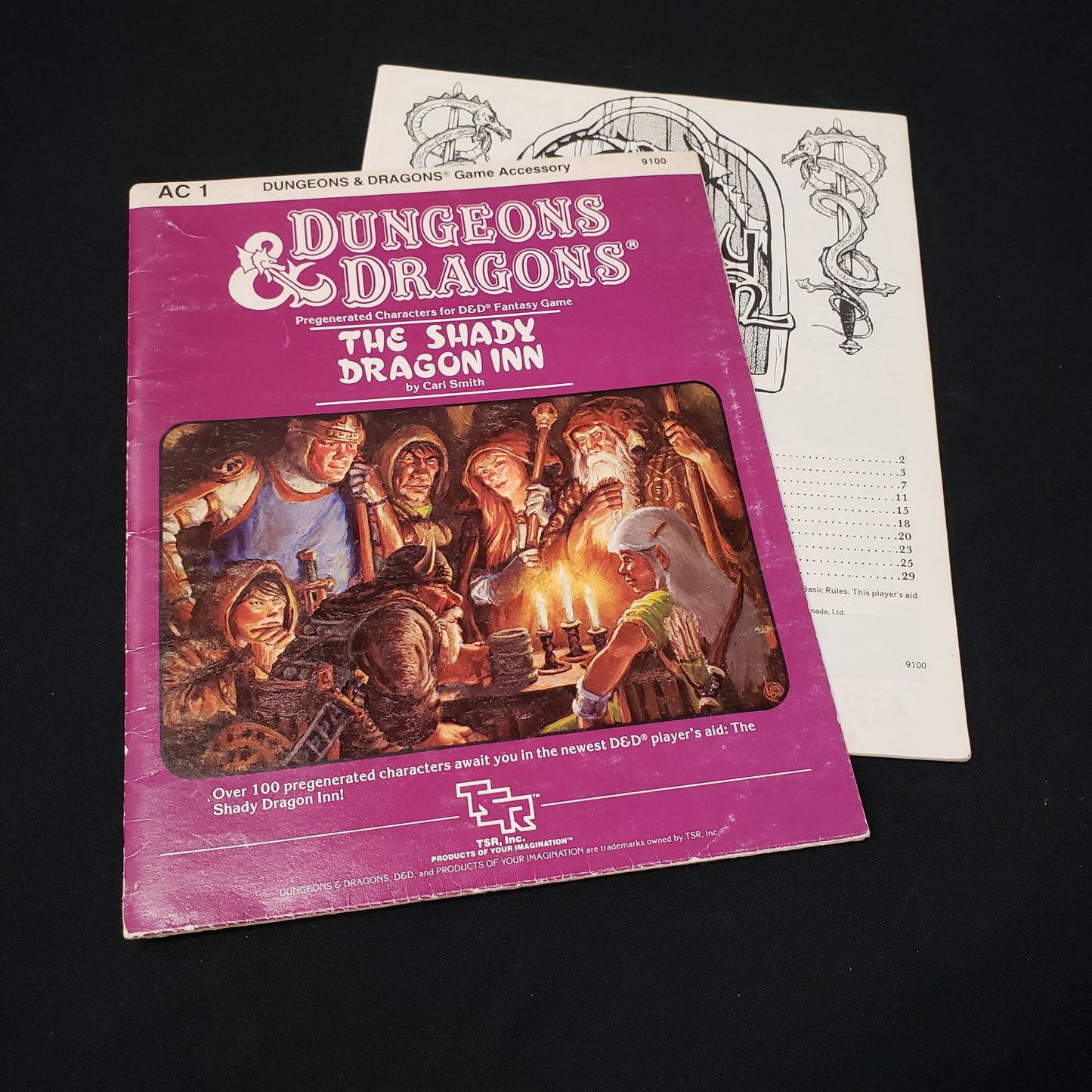 Image shows the booklet & front cover of the folio for the Shady Dragon Inn adventure book for the roleplaying game Dungeons & Dragons: First Edition