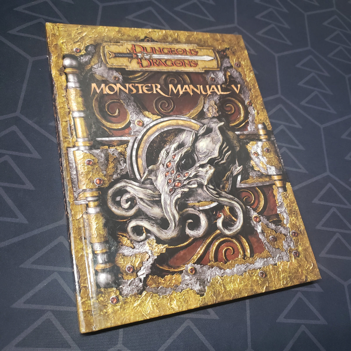 Image shows the front cover of the Monster Manual V book for the roleplaying game Dungeons & Dragons 3.5E