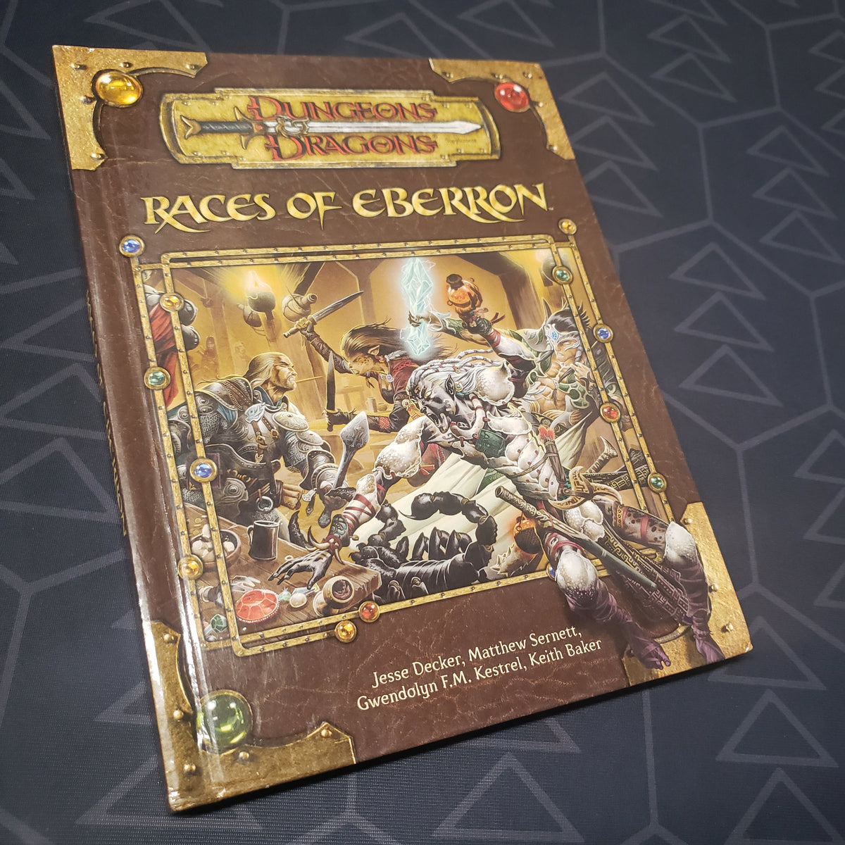 Image shows the front cover of the Races of Eberron book for the roleplaying game Dungeons & Dragons 3.5E