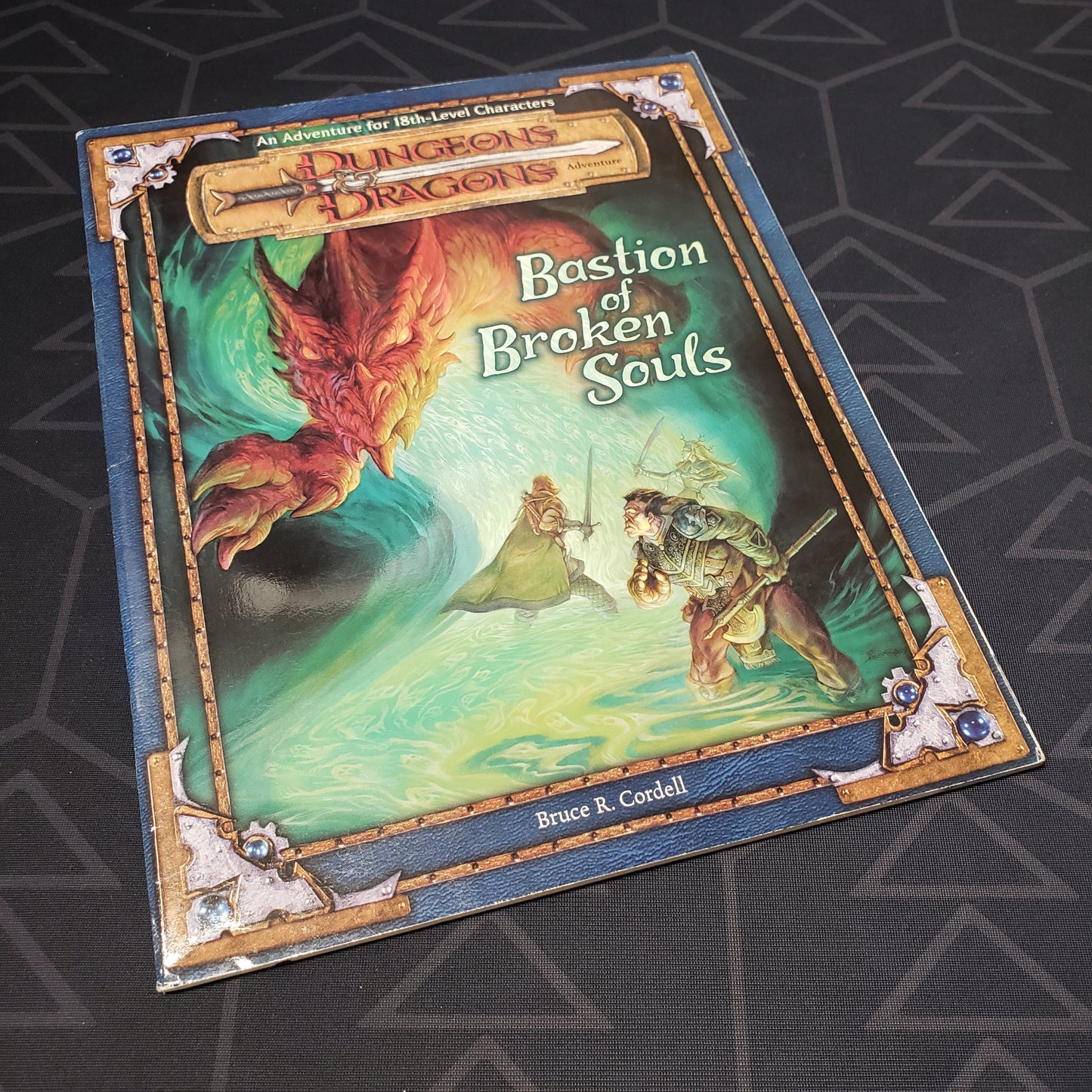 Image shows the front cover of the Bastion of Broken Souls adventure module book for the roleplaying game Dungeons & Dragons: Third Edition