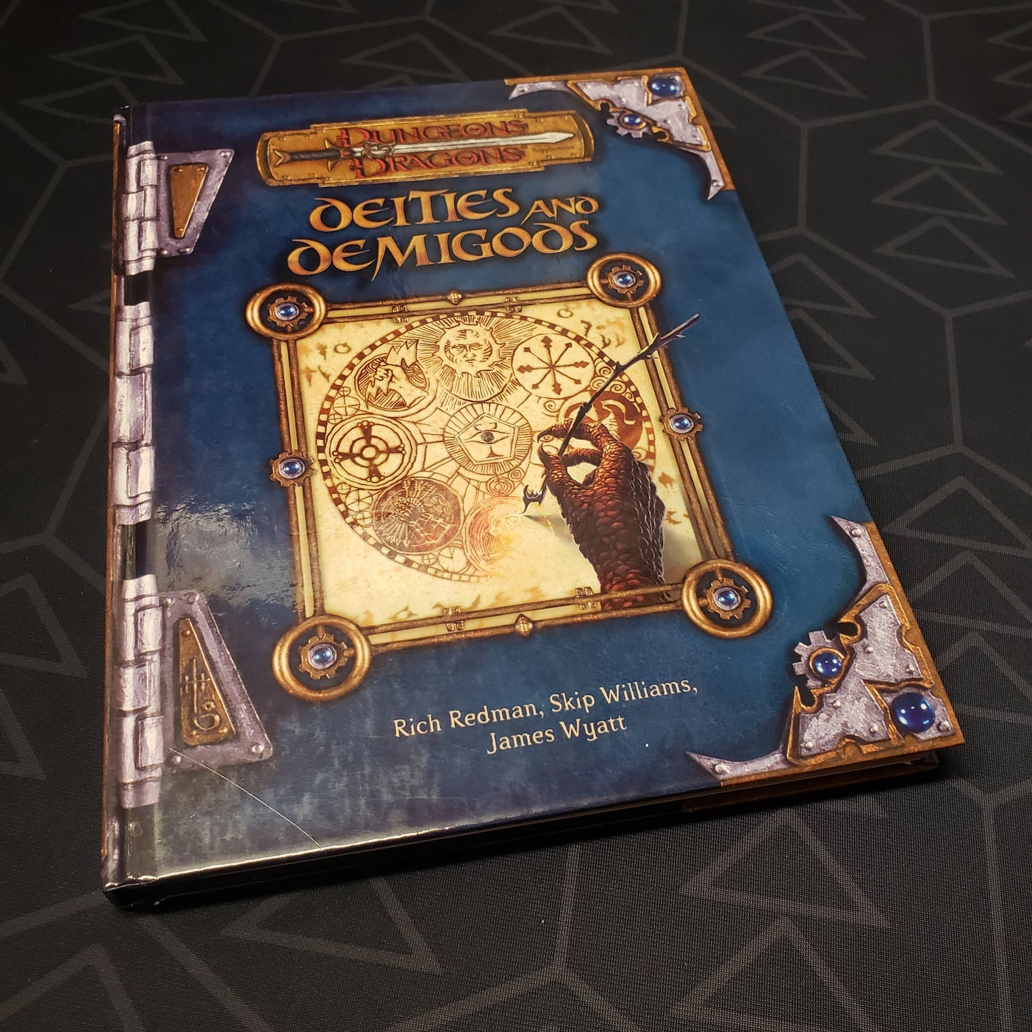 Image shows the front cover of the Deities and Demigods book for the roleplaying game Dungeons & Dragons: Third Edition