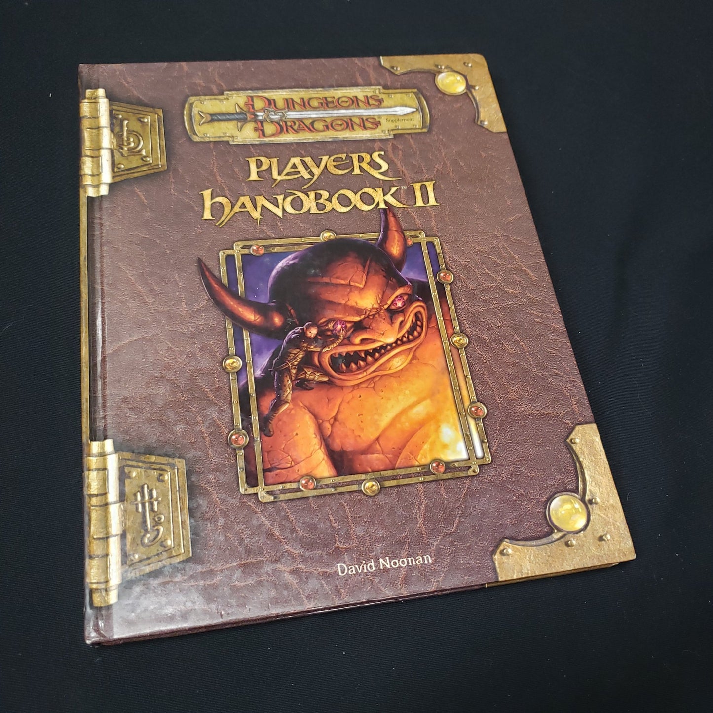 Image shows the front cover of the Player's Handbook II for the roleplaying game Dungeons & Dragons: Third Edition