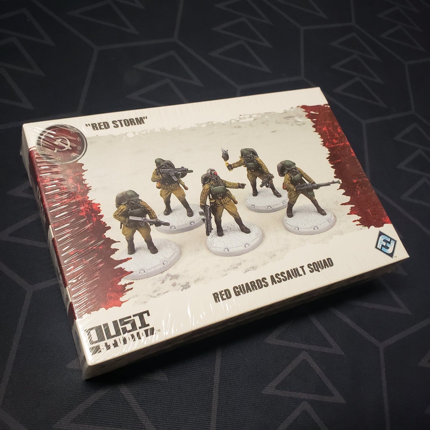 Image shows the front cover of the box of the Red Guards Assault Squad: "Red Storm" pack for the miniatures game Dust Tactics