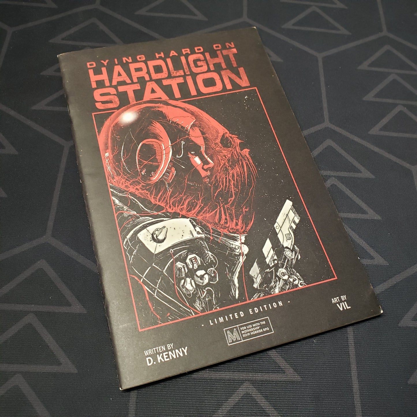 Image shows the front cover of the Dying Hard on Hardlight Station Limited Edition roleplaying game book