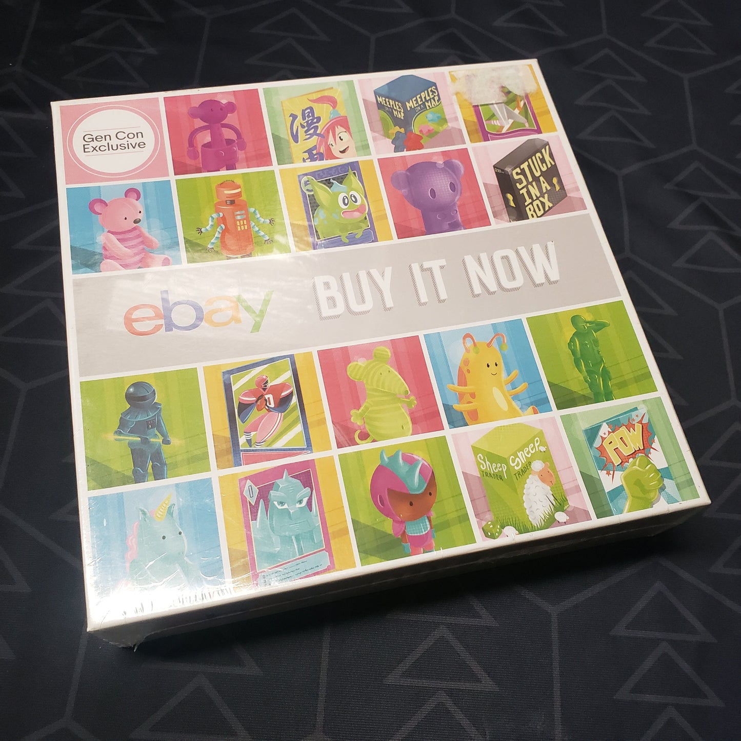 Image shows the front cover of the box for the eBay Buy It Now board game
