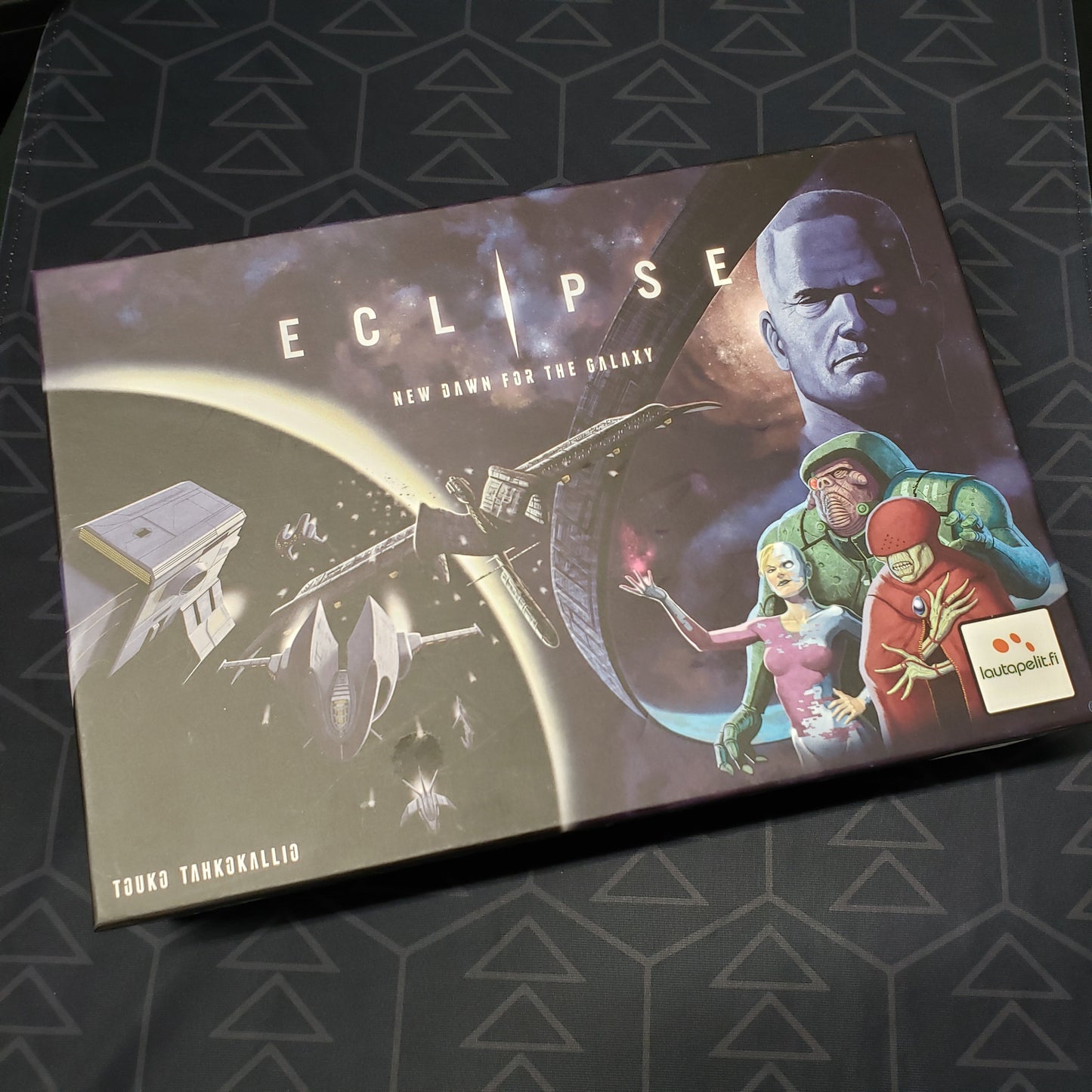 Image shows the front cover of the box of the Eclipse: New Dawn for the Galaxy board game