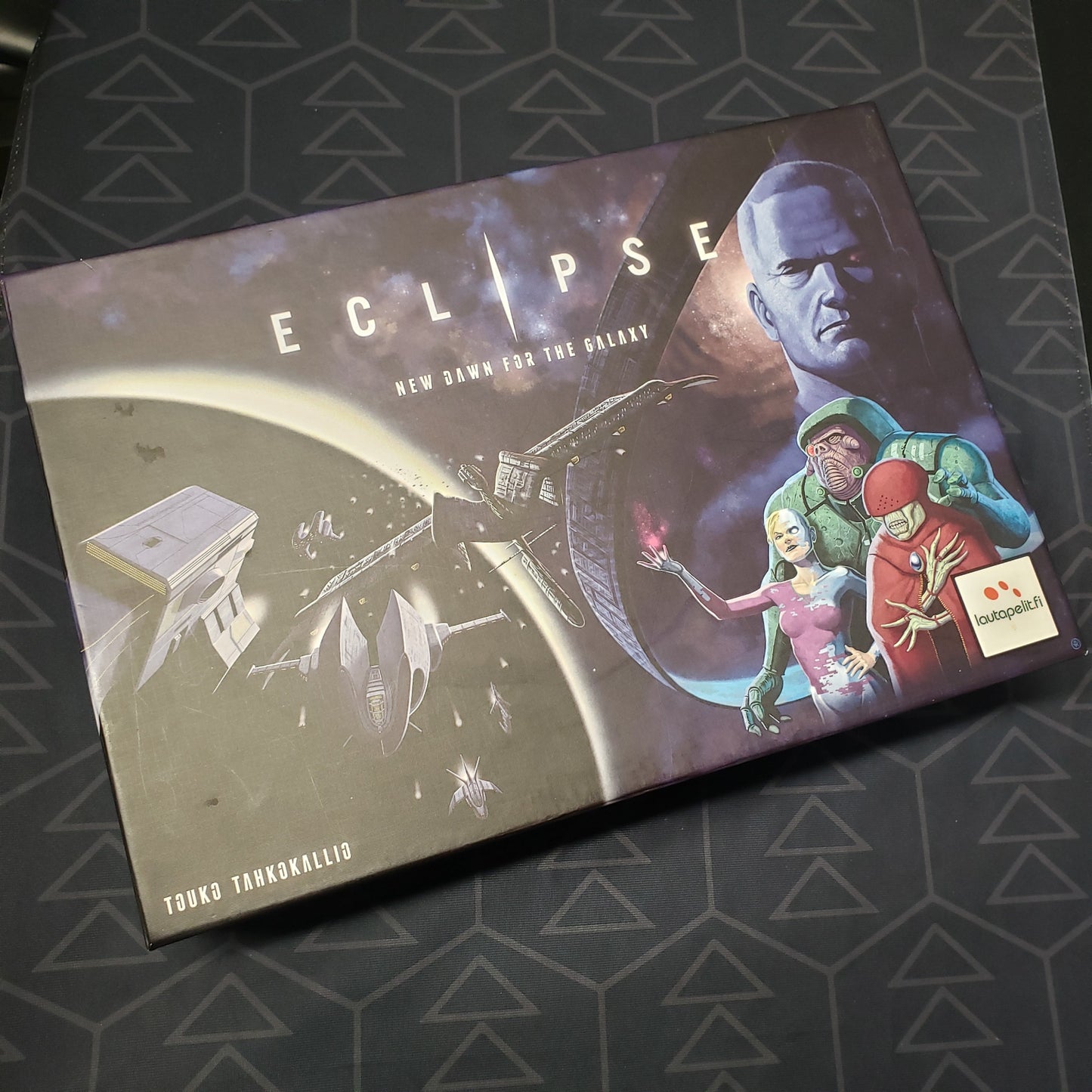 Image shows the front cover of the box of the Eclipse: New Dawn for the Galaxy board game