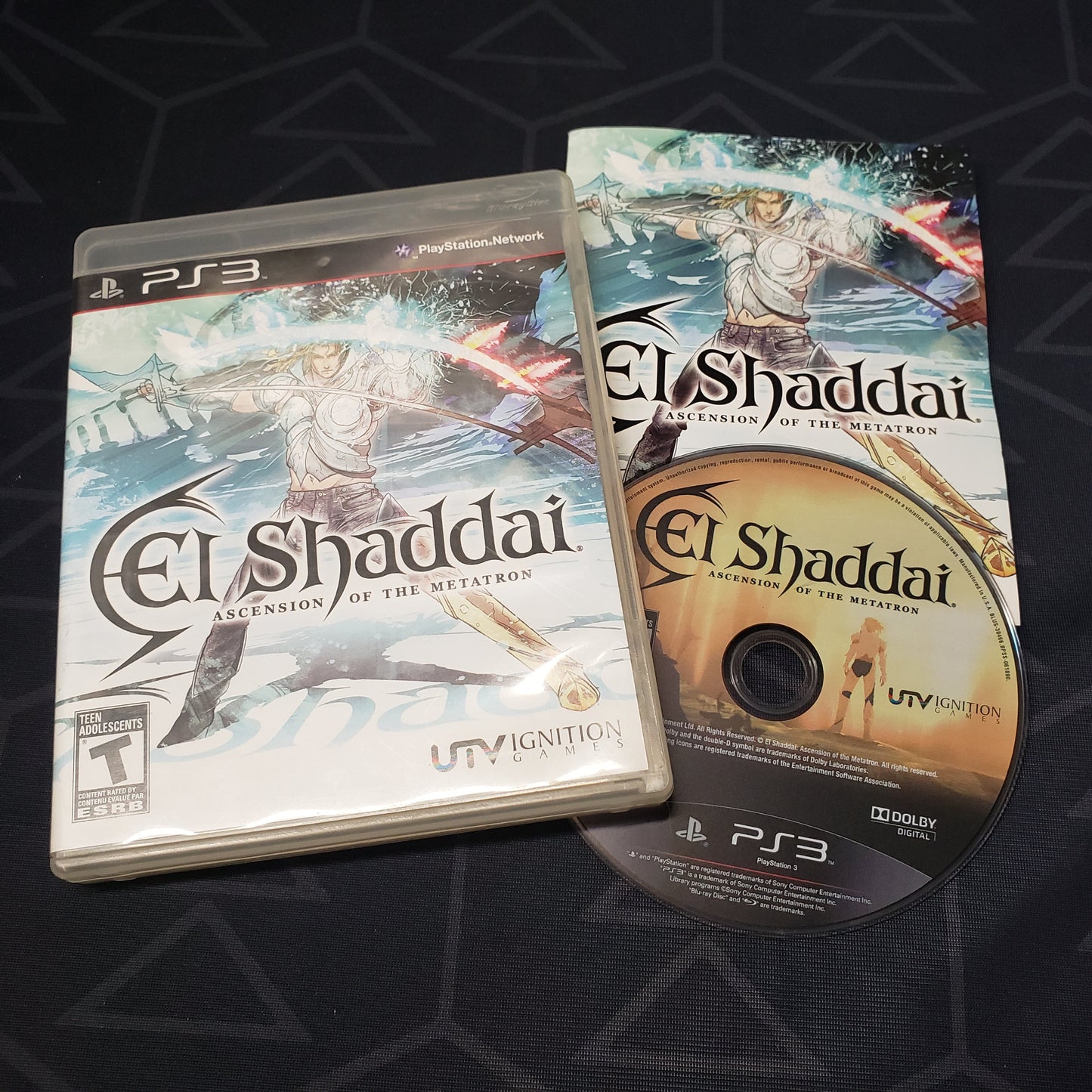 Image shows the case, manual and disc for the video game El Shaddai: Ascension of the Metatron for Playstation 3