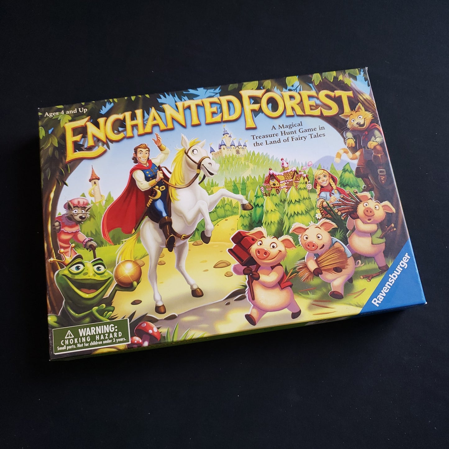 Image shows the front cover of the box of the Enchanted Forest board game