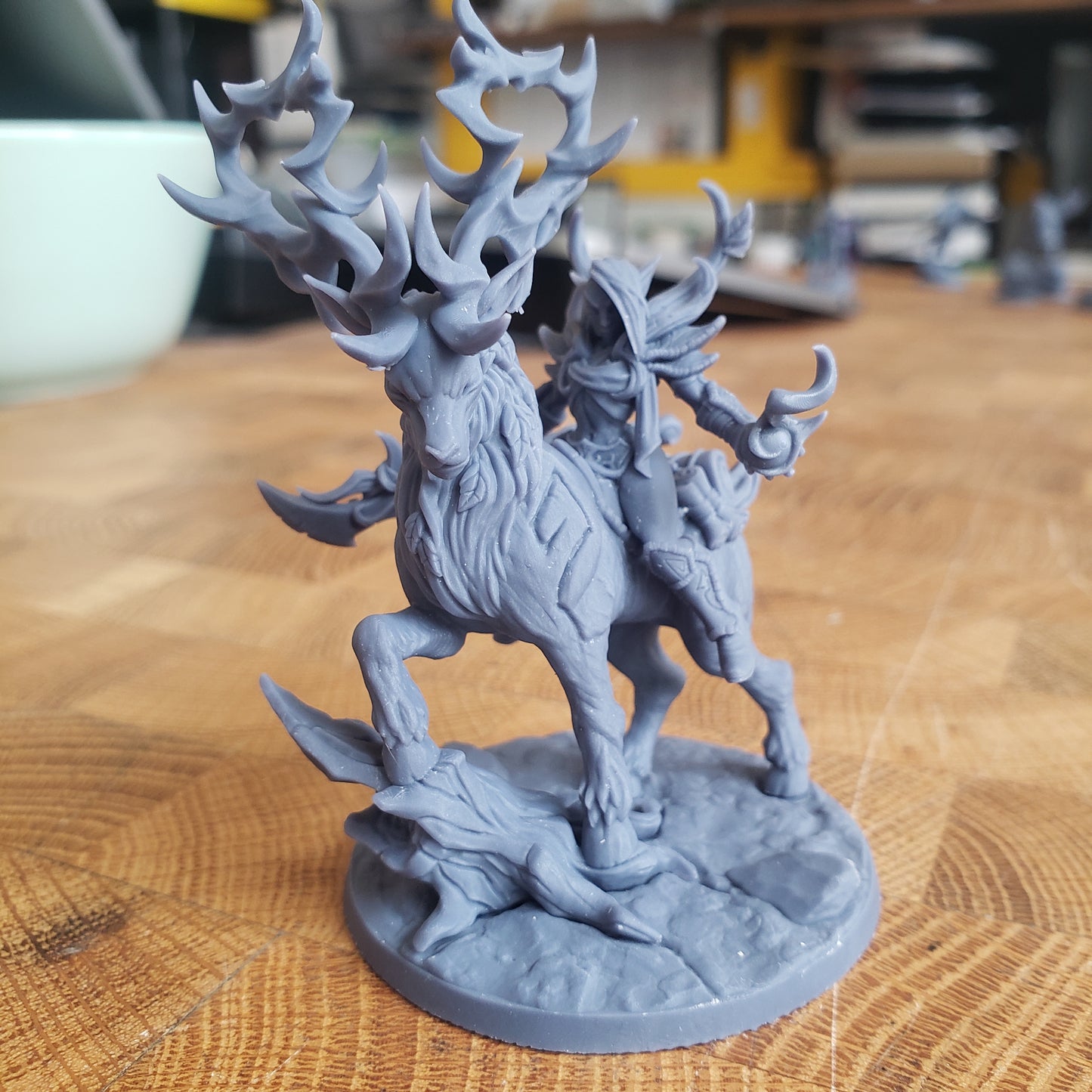 Image is a photo of a 3D printed gaming miniature printed in-house at All Systems Go depicting an elf ranger riding a stag