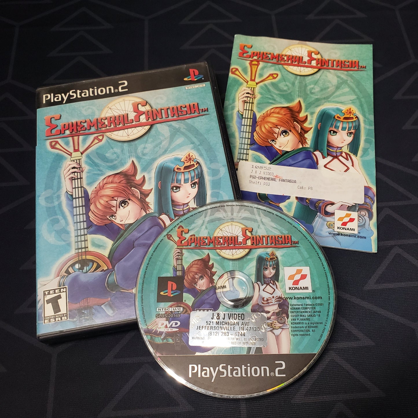 Image shows the case, manual & disc for the video game Ephemeral Fantasia for Playstation 2