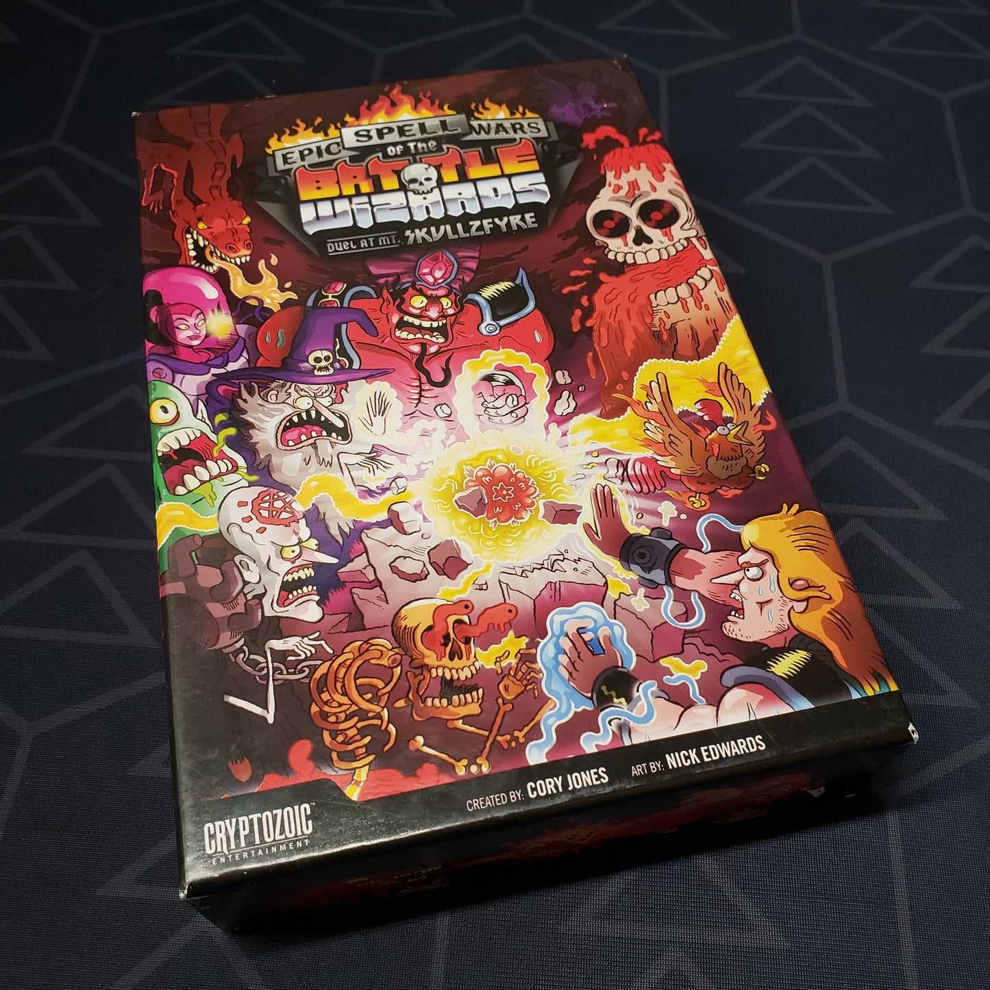 Image shows the front cover of the box of the Epic Spell Wars: Duel at Mt. Skullzfyre card game