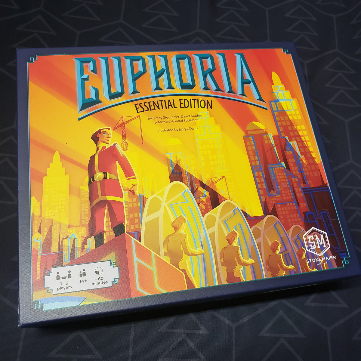 Image shows the front cover of the box for the Euphoria Essential Edition board game