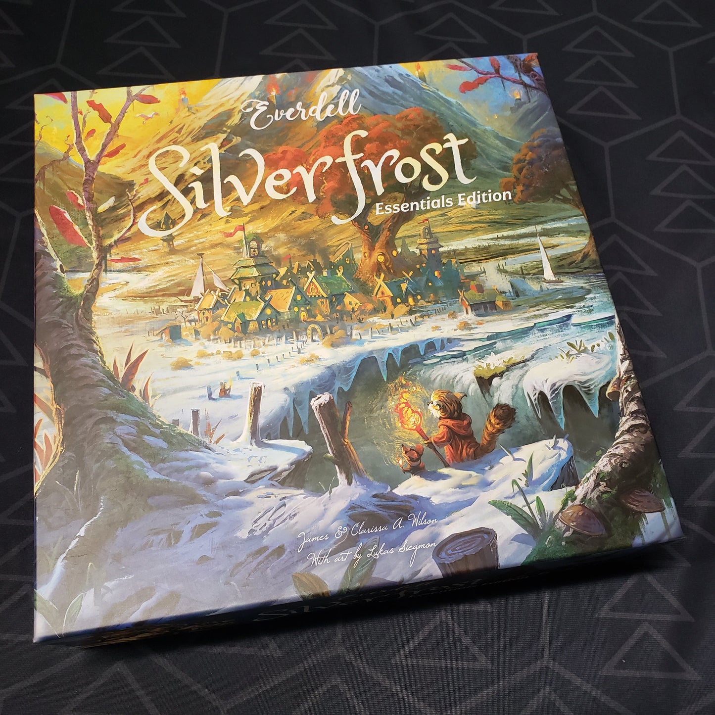 Image shows the front cover of the box for the Everdell: Silverfrost (Essentials Edition) board game