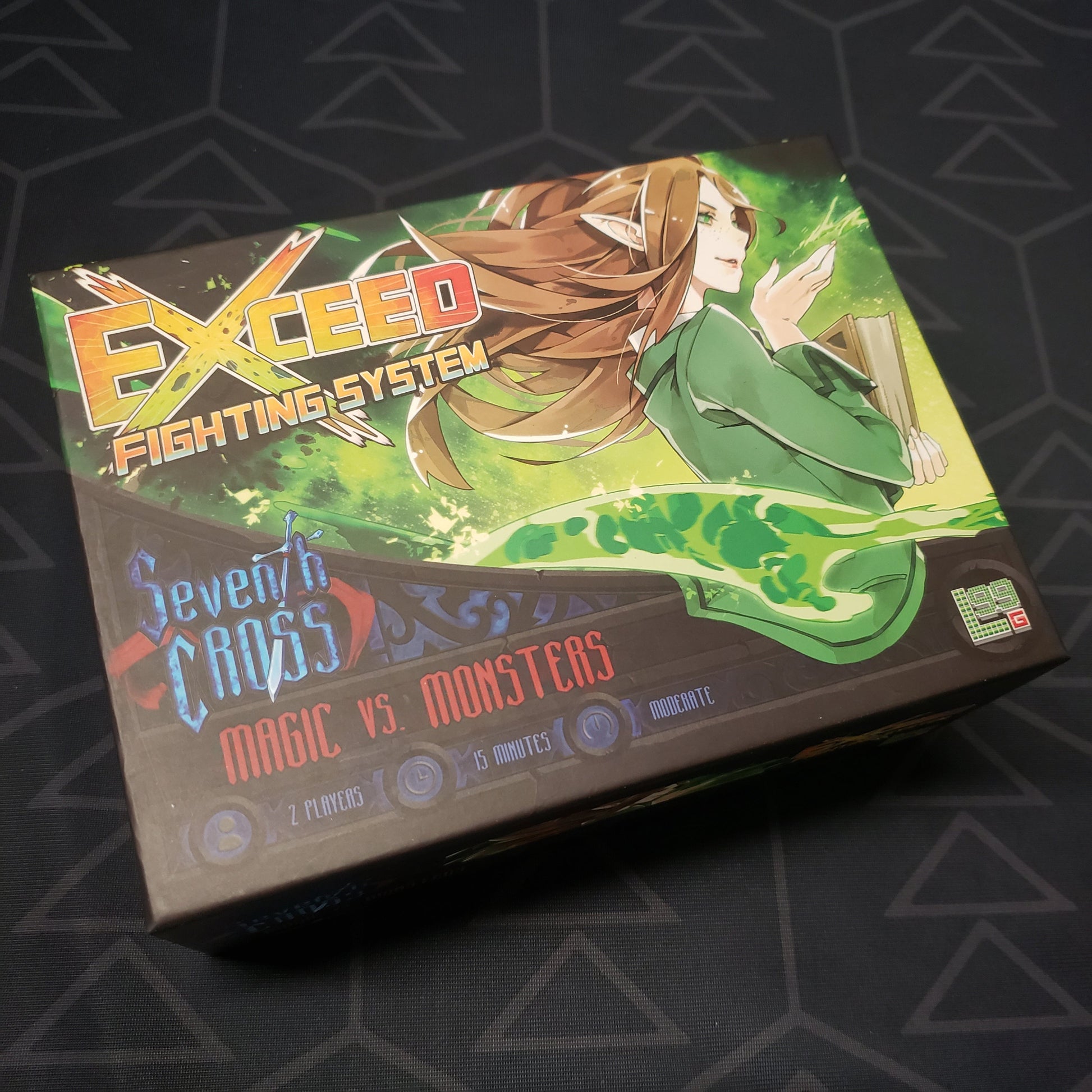 Image shows the front cover of the box for the Exceed: Seventh Cross - Magic vs. Monsters Box card game