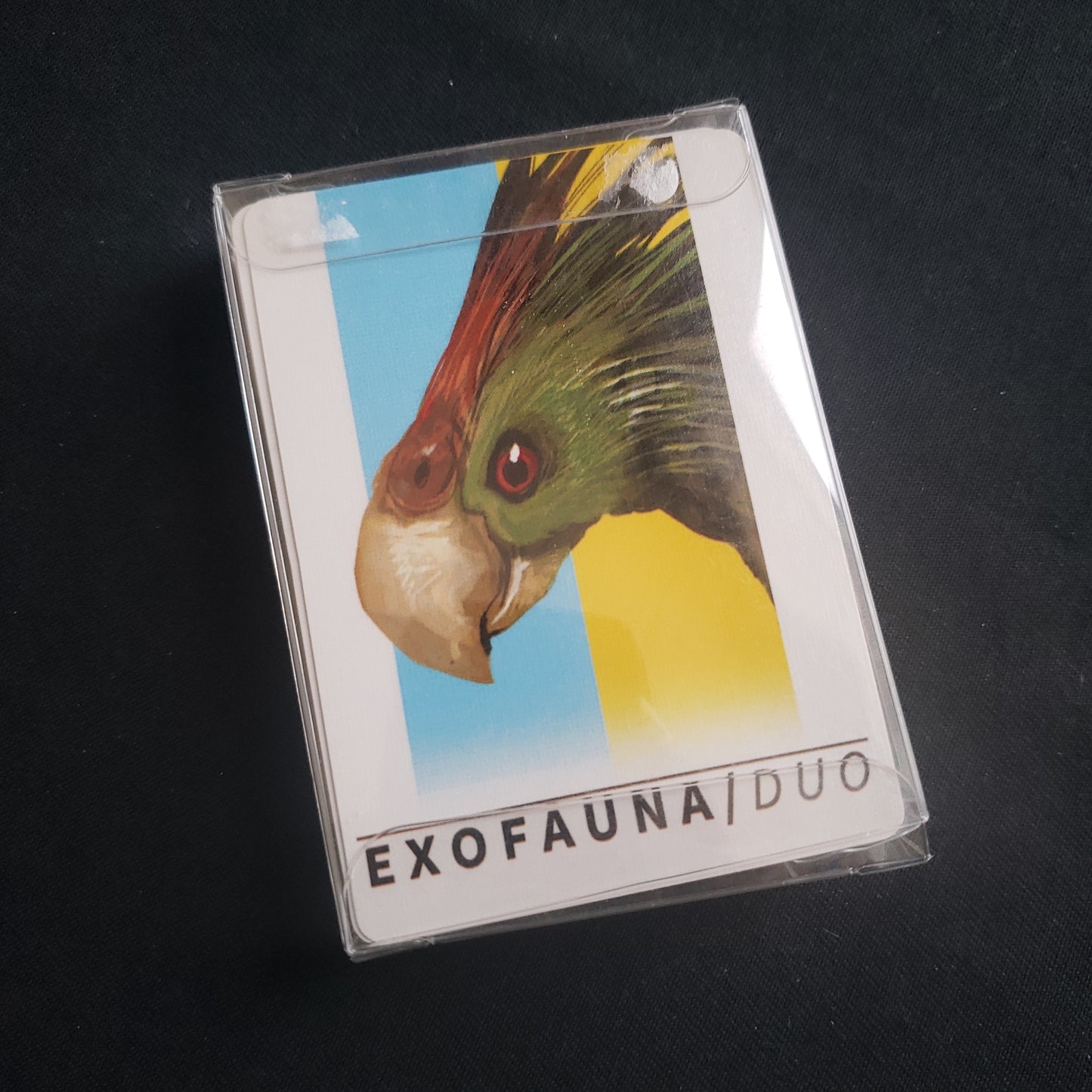 Image shows the front cover of the box of the Exofauna/Duo card game