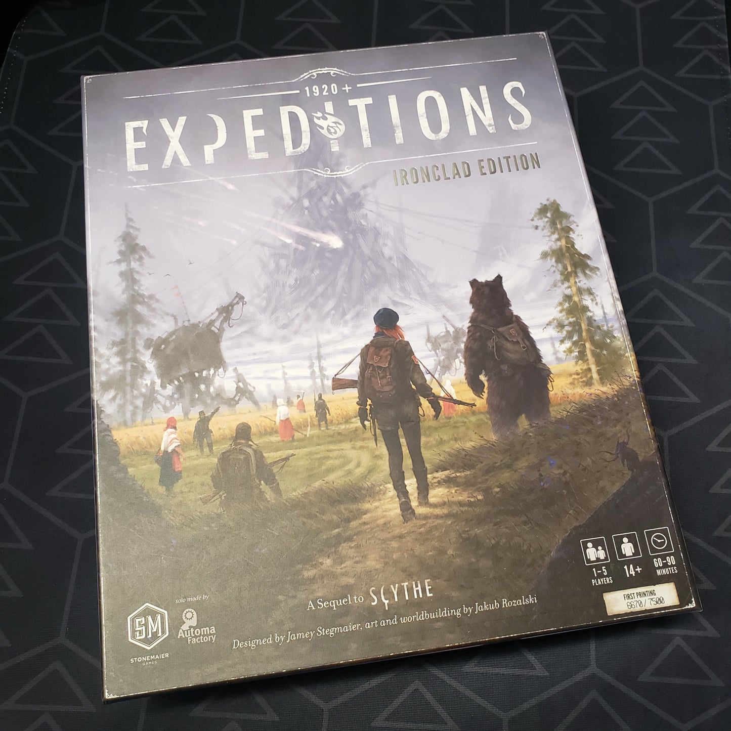 Image shows the front cover of the box of the Ironclad Edition of the board game Expeditions