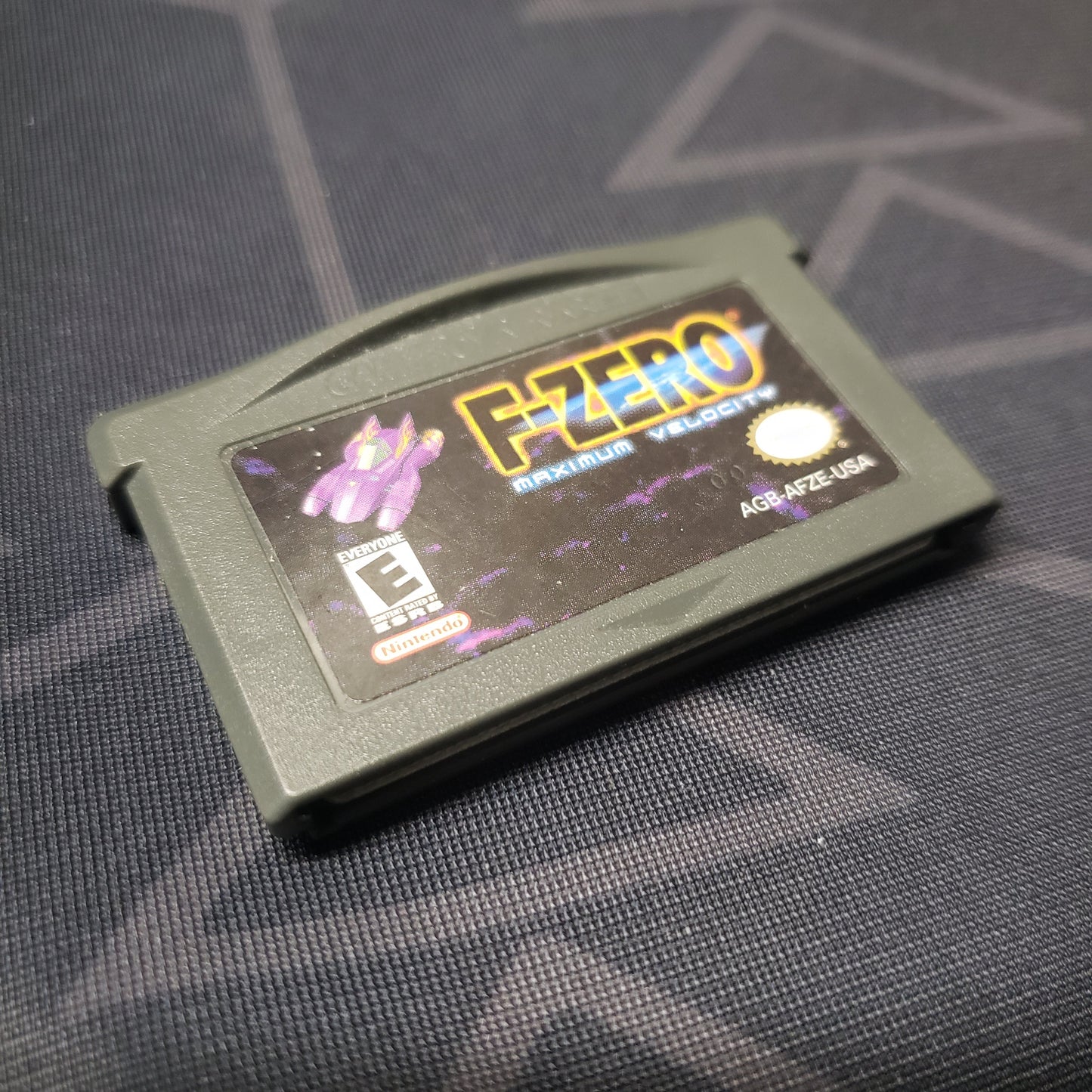 Image shows the front of the cartridge for the video game F-Zero: Maximum Velocity for Nintendo Game Boy Advance