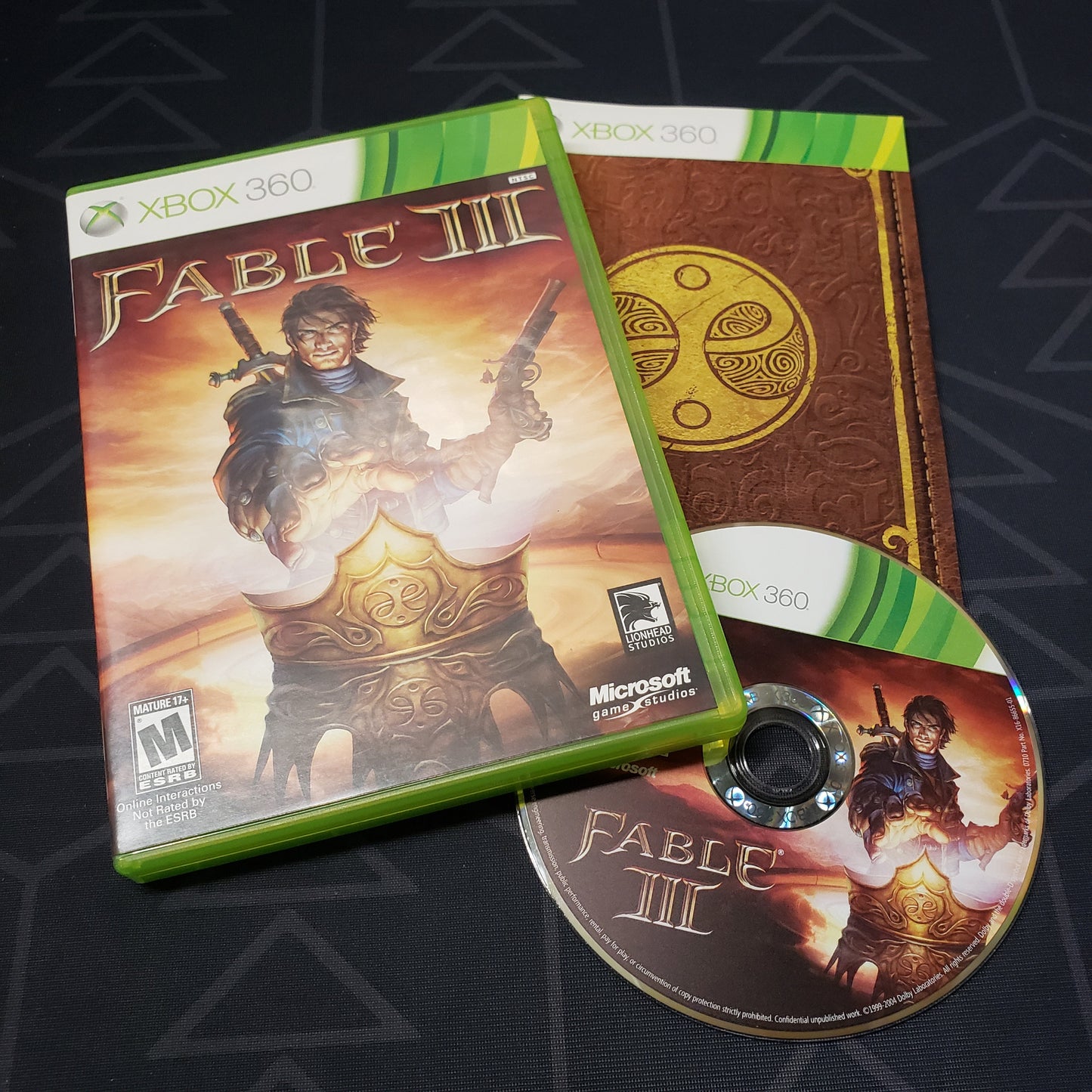 Image shows the case, manual and disc for the video game Fable III for Xbox 360