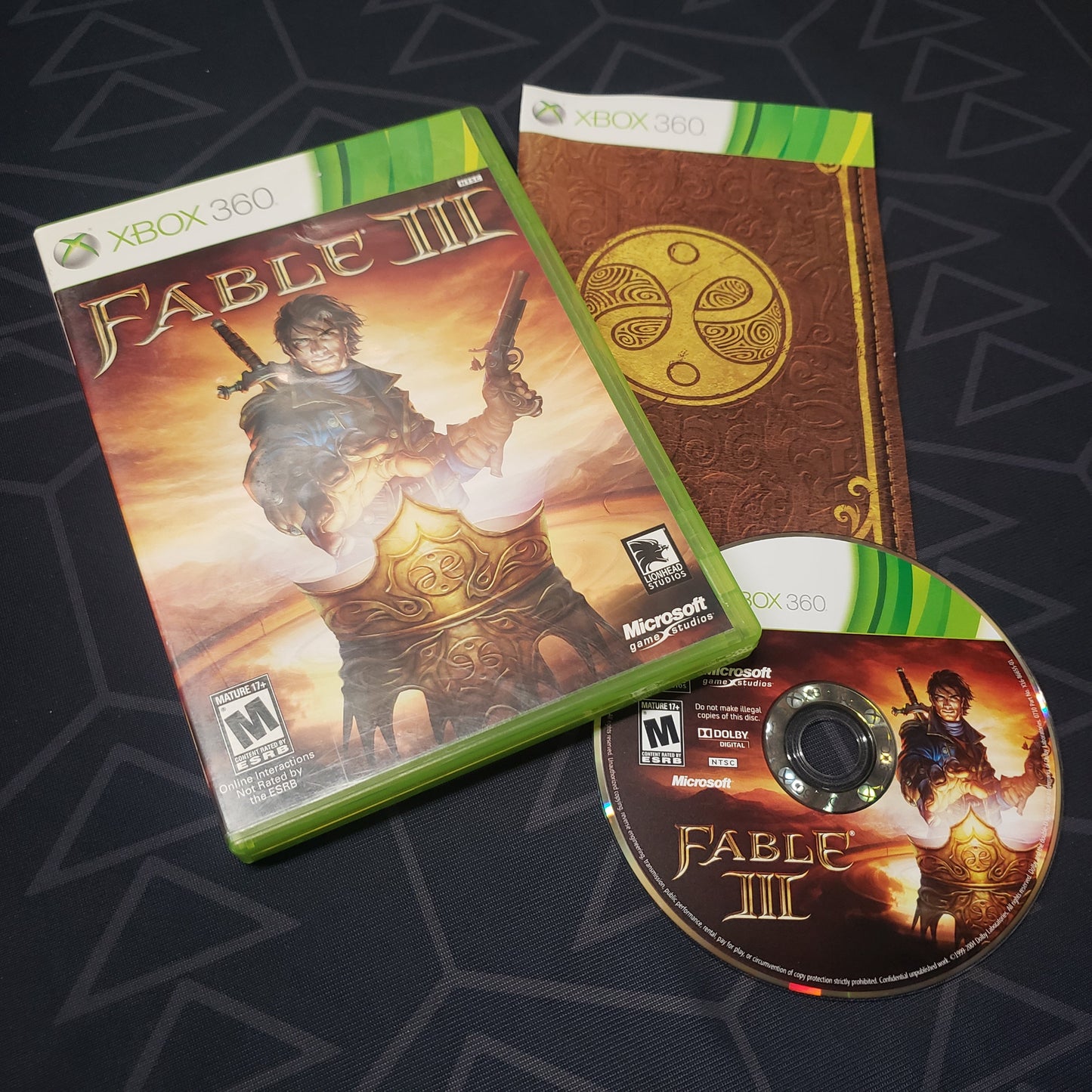 Image shows the case, manual and disc for the video game Fable III for Xbox 360
