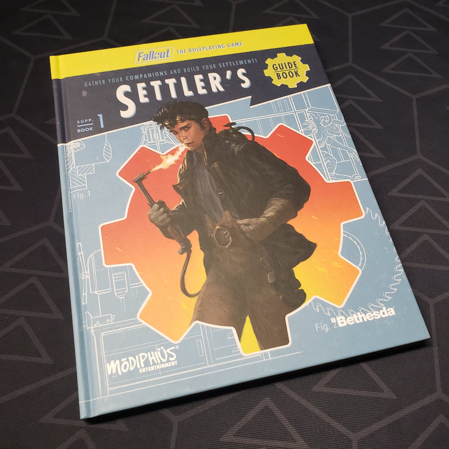 Image shows the front cover of the Settler's Guide Book for the roleplaying game Fallout