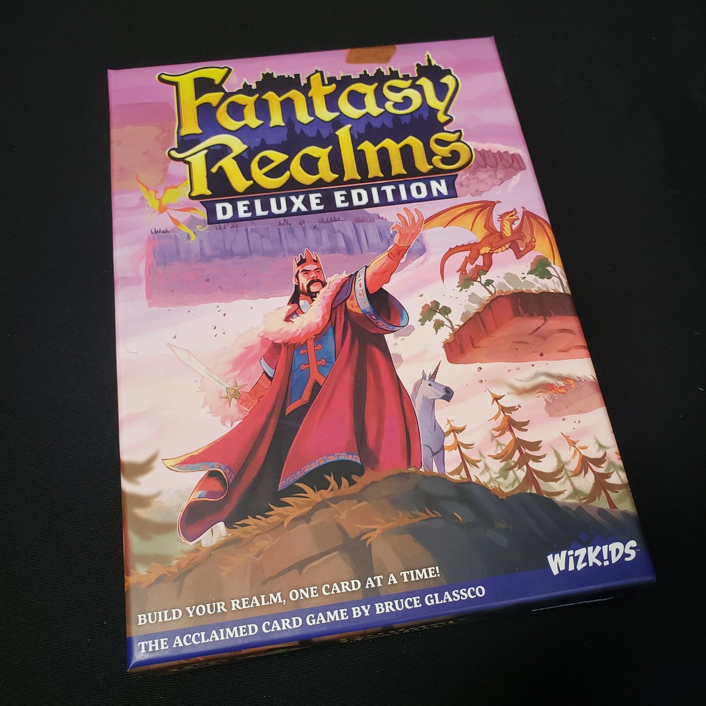 Image shows the front cover of the box of the Fantasy Realms (Deluxe Edition) card game