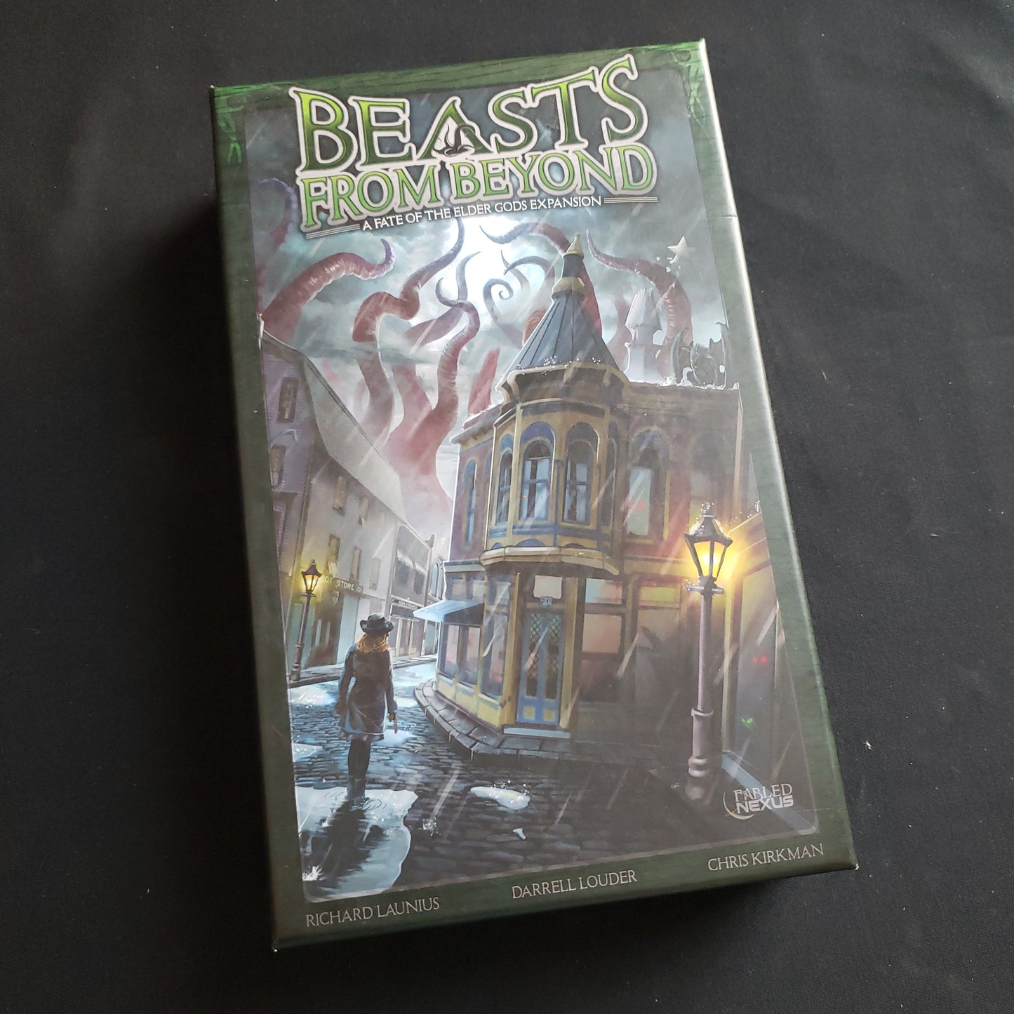Image shows the front cover of the box of the Beasts From Beyond expansion for the Fate of the Elder Gods board game