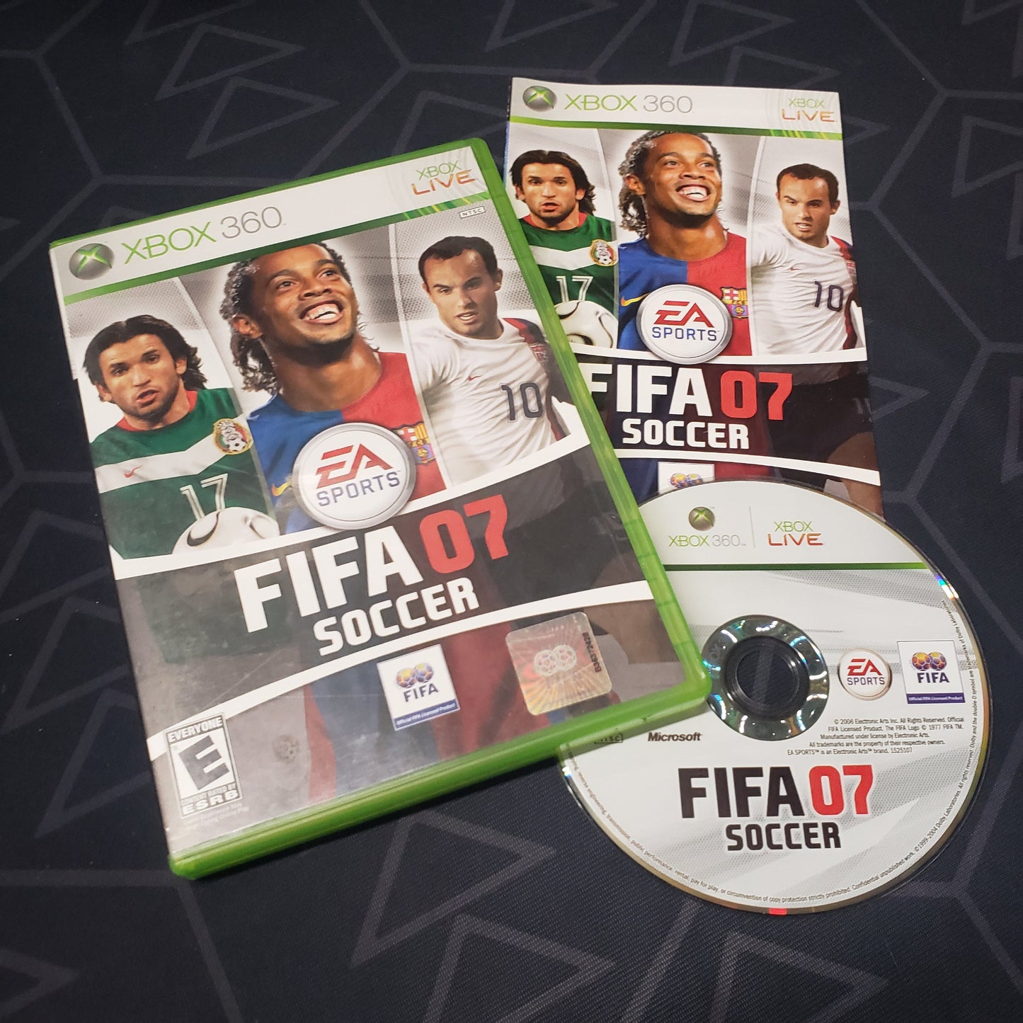 Image shows the case, manual and disc for the video game FIFA Soccer 07 for Xbox 360