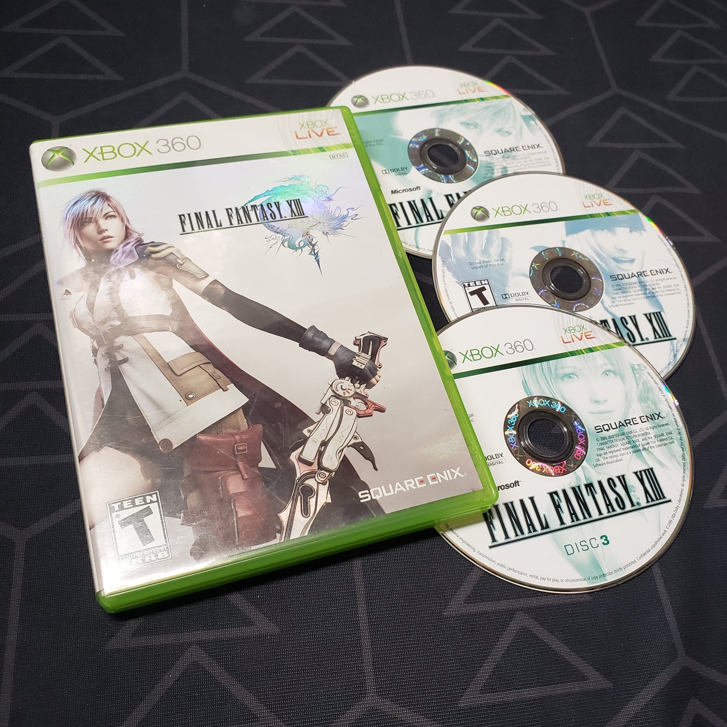 Image shows the case and three discs for the video game Final Fantasy XIII for Xbox 360