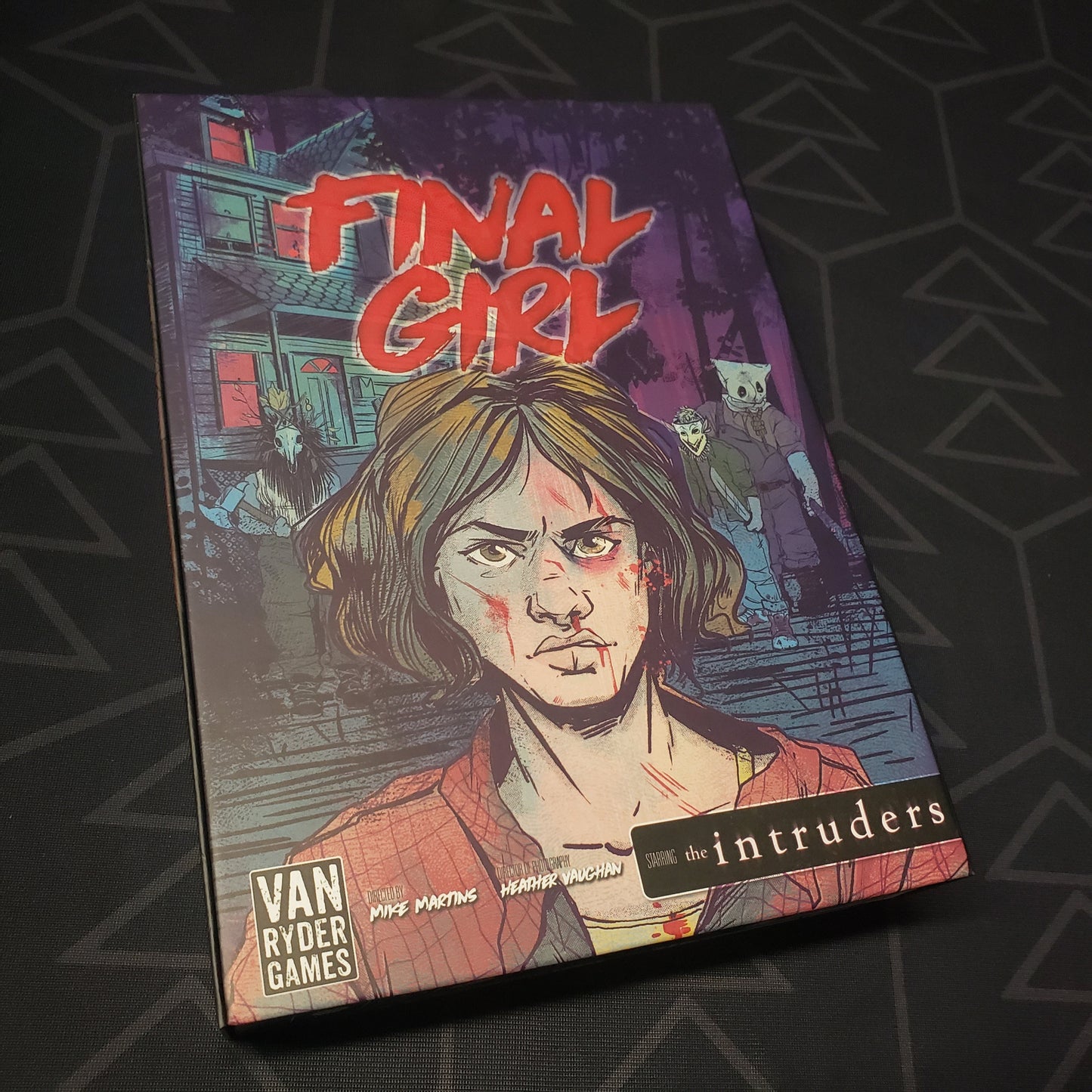 Image shows the front of the box for the Knock at the Door Feature Film Expansion for the Final Girl board game