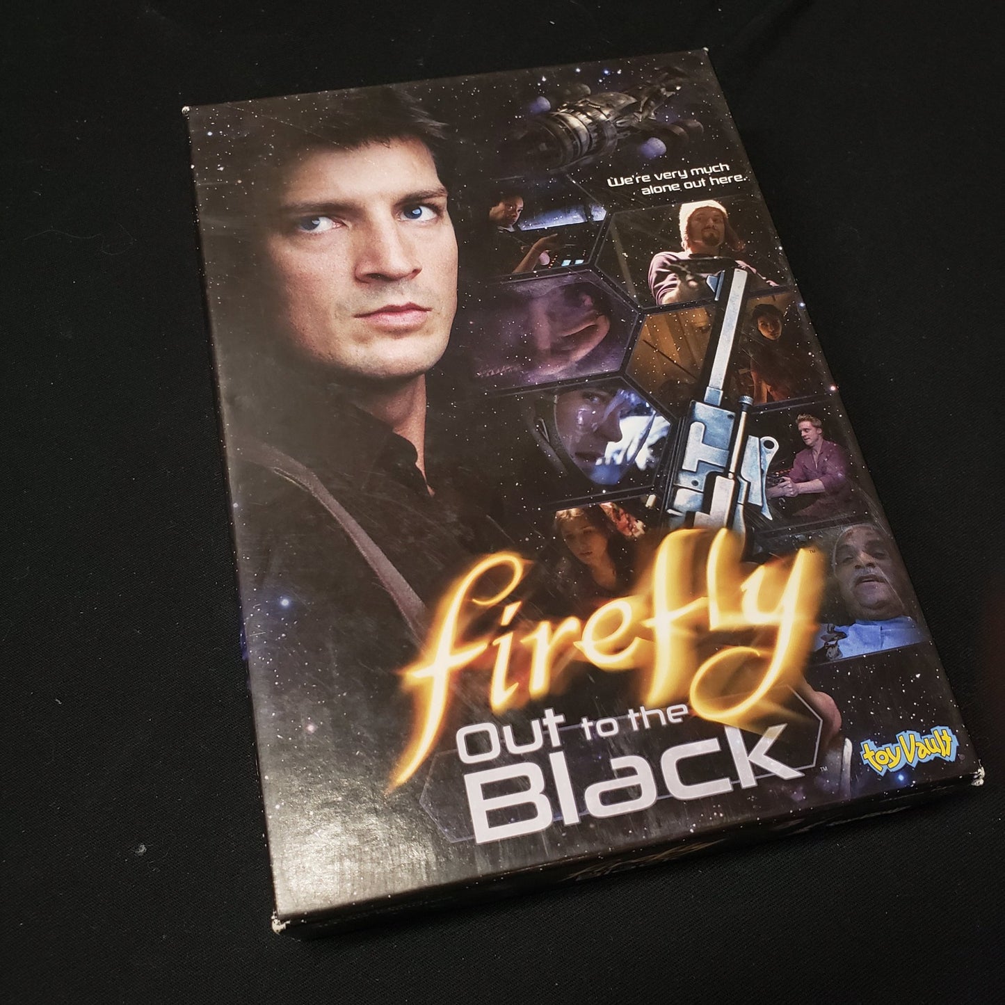 Image shows the front cover of the box of the Firefly: Out to the Black card game