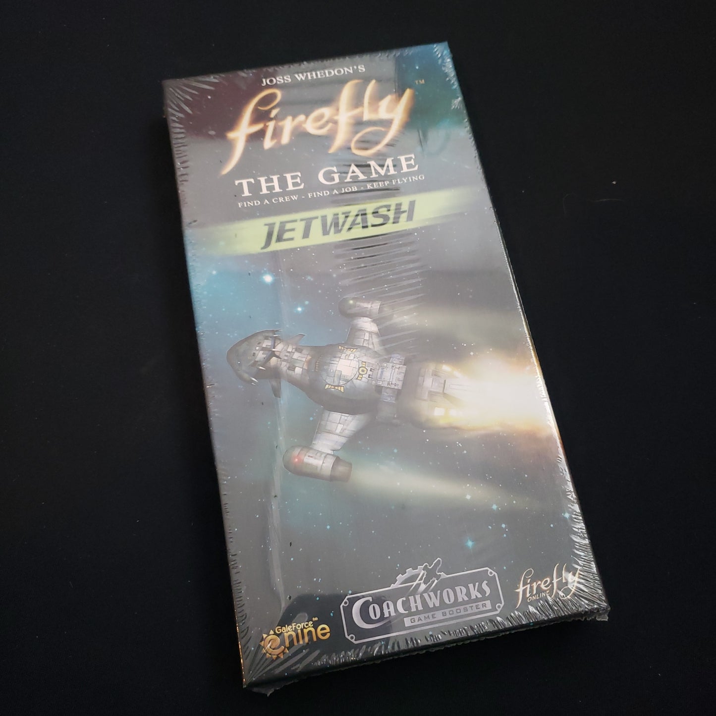 Image shows the front cover of the box of the Jetwash expansion for the board game Firefly: The Game