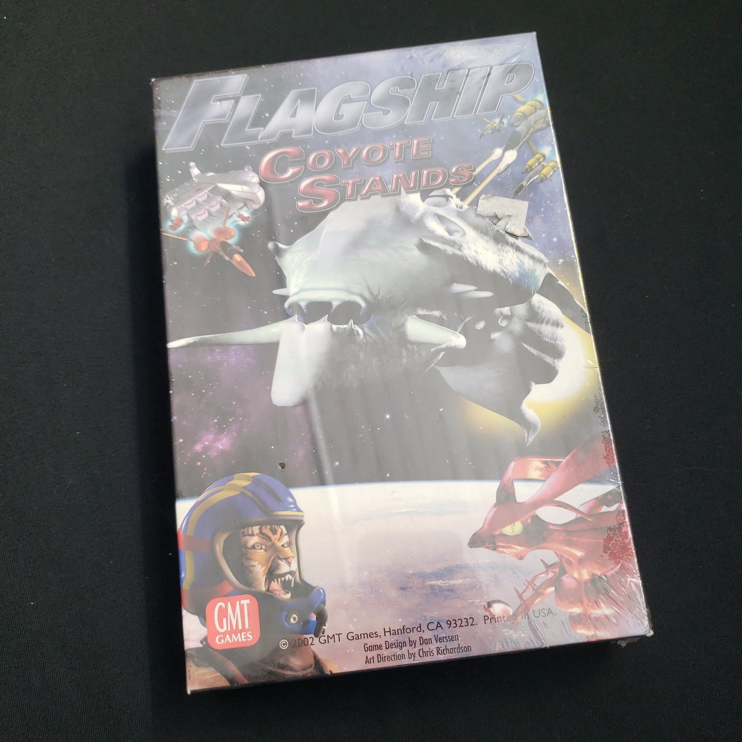 Image shows the front cover of the box of the Flagship: Coyote Stands board game