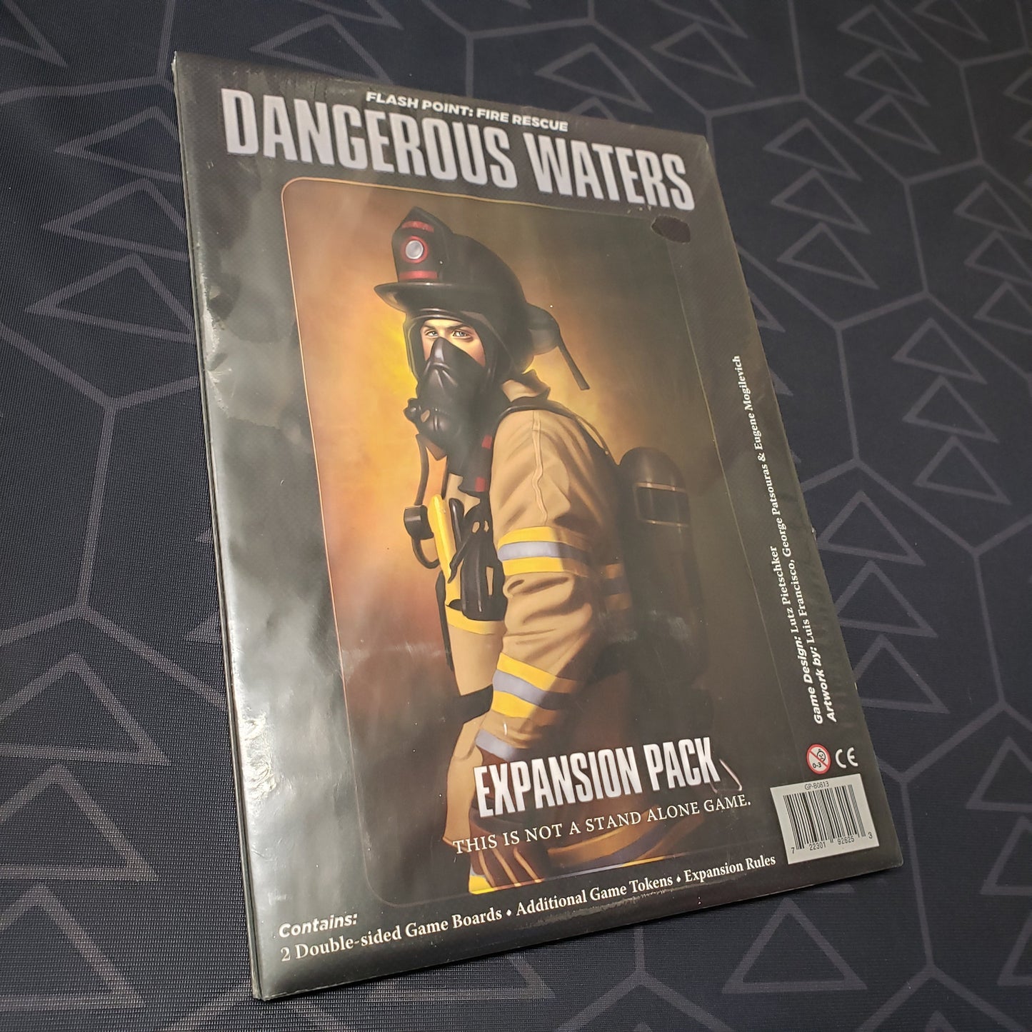Image shows the front cover of the box of the Dangerous Waters expansion for the board game Flash Point: Fire Rescue