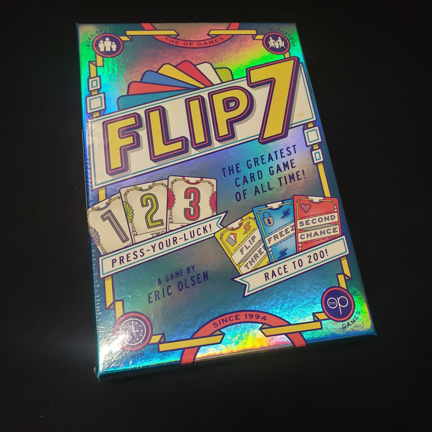 Image shows the front cover of the box of the Flip 7 card game