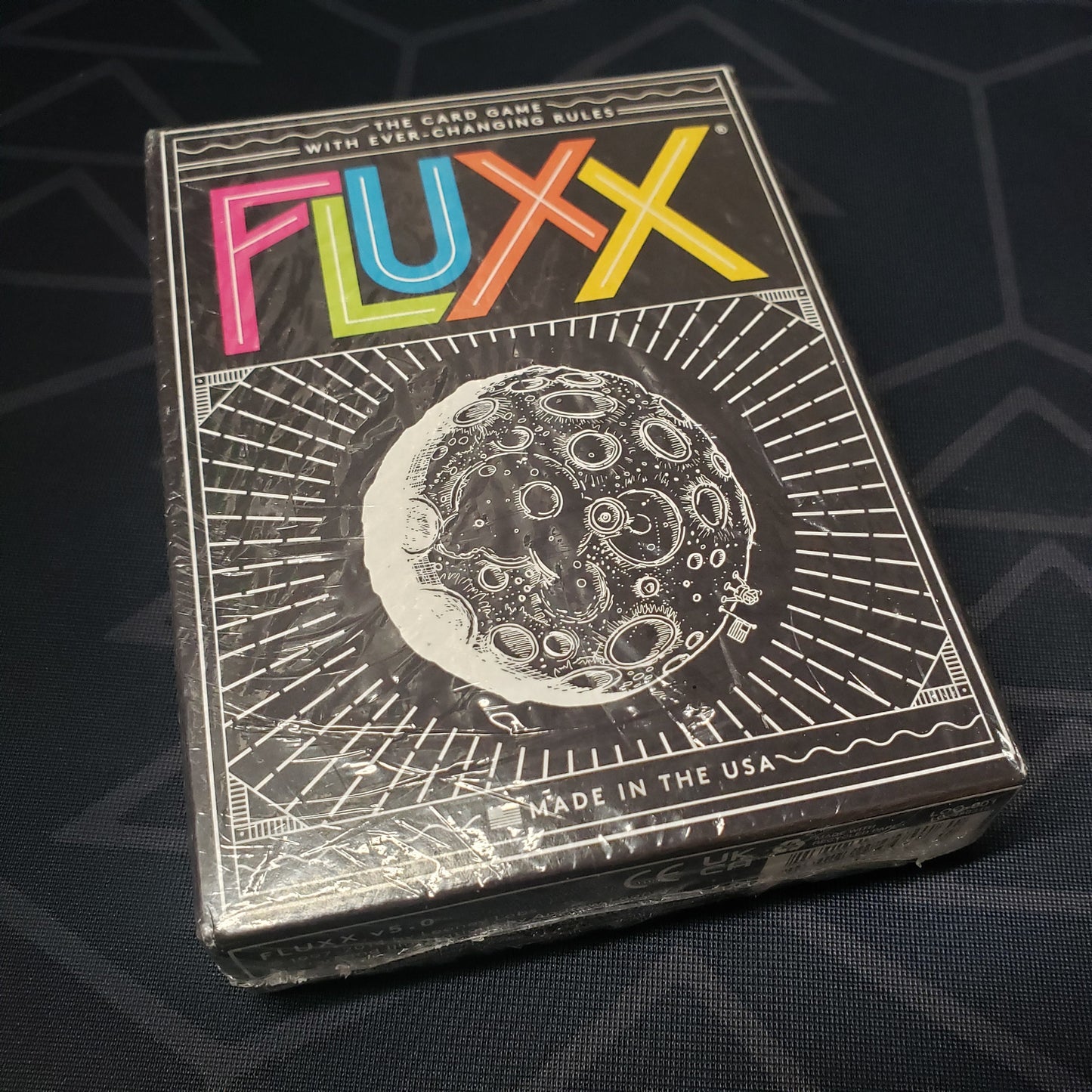 Image shows the front cover of the box of the Fluxx card game