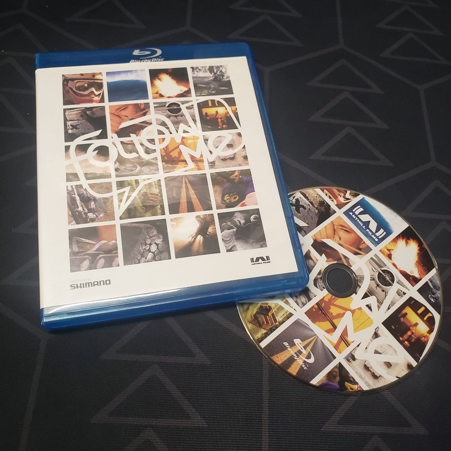 Image shows the case & disc for the movie Follow Me...: An HD Mountain Bike Film on Blu-Ray