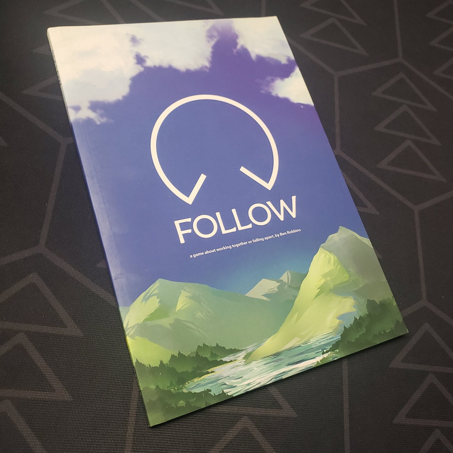 Image shows the front cover of the Follow roleplaying game book